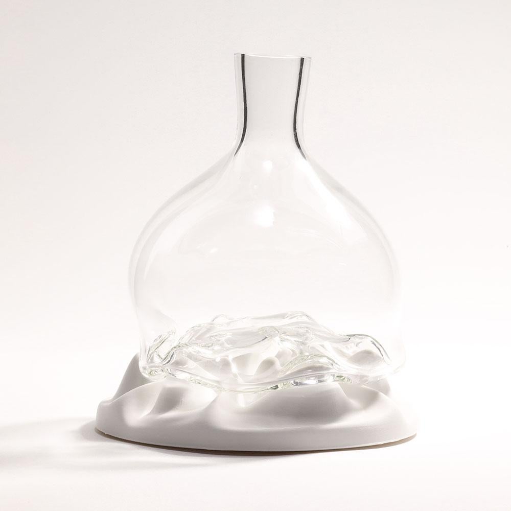 The Flora Decanter is a unique collaboration designed and created by Julia Koerner & Austin Fields in Los Angeles. It is inspired by Californian landscapes, organic flora and fauna, the liquid flow of light and fluid dynamics of the ocean. 

Through
