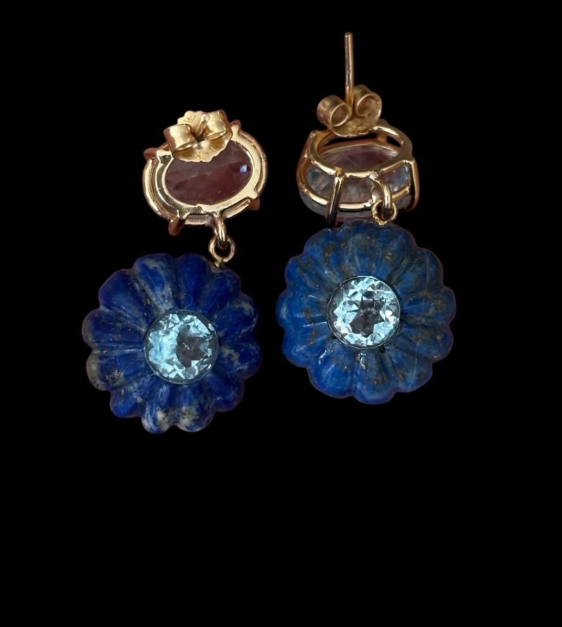 FLORA Earrings

Lapis, Blue Topaz & 14k Gold

The carved lapis melon flowers (15mm in diameter) have stunning 7mm round blue topaz centers that are bezeled in 14k Gold. Equally stunning are the oval 10x7mm blue topaz’ at the top.

The color