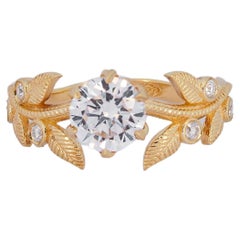 Flora engagement ring with with round moissanite in 14k gold