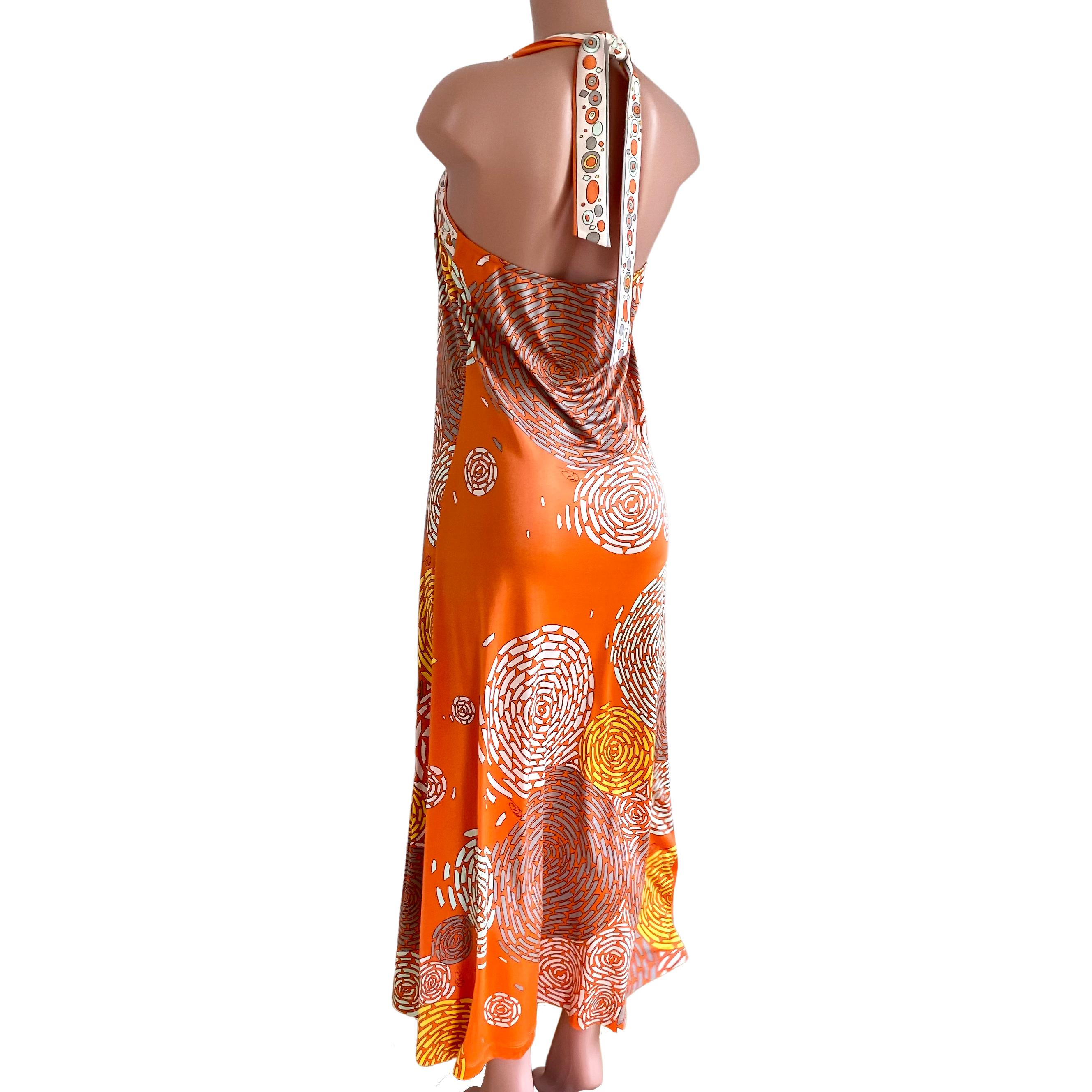 Stylized chrysanthemum mixed-print silk jersey boho maxi dress.
Wear it with a belt or as is. Dress it up or down.
Self-tie at the back neck for a perfect fit. Generous skirt made with yards of luxurious pure silk.
To learn more about Flora the