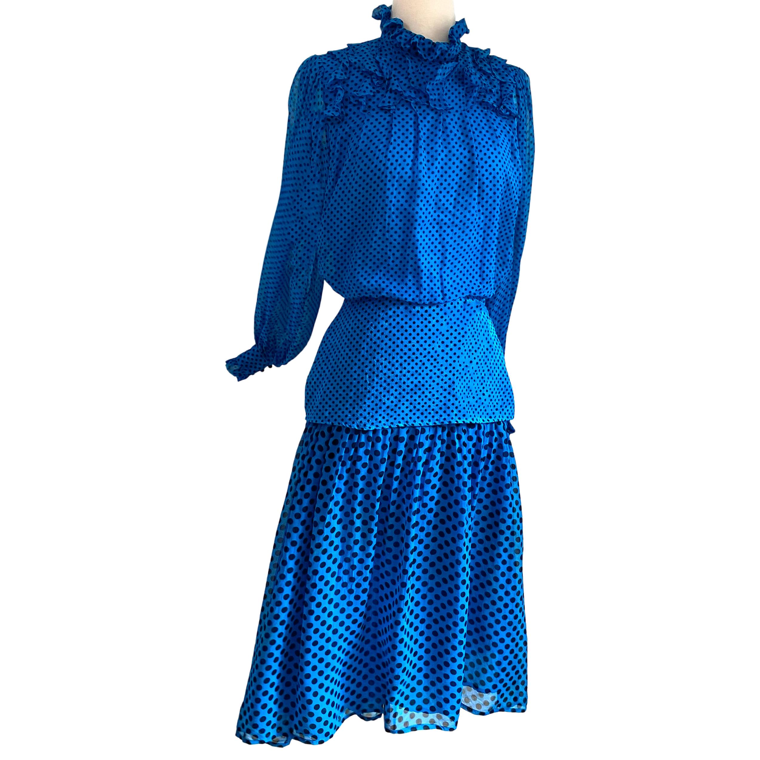 Cobalt silk chiffon georgette dress with generous billowy sleeves, hip yoke, fly-away skirt and just enough ruffles.
Material: 100% long-filament silk chiffon georgette with matching mixed-media silk jacquard yoke.
Lining: 100% silk
Print: black