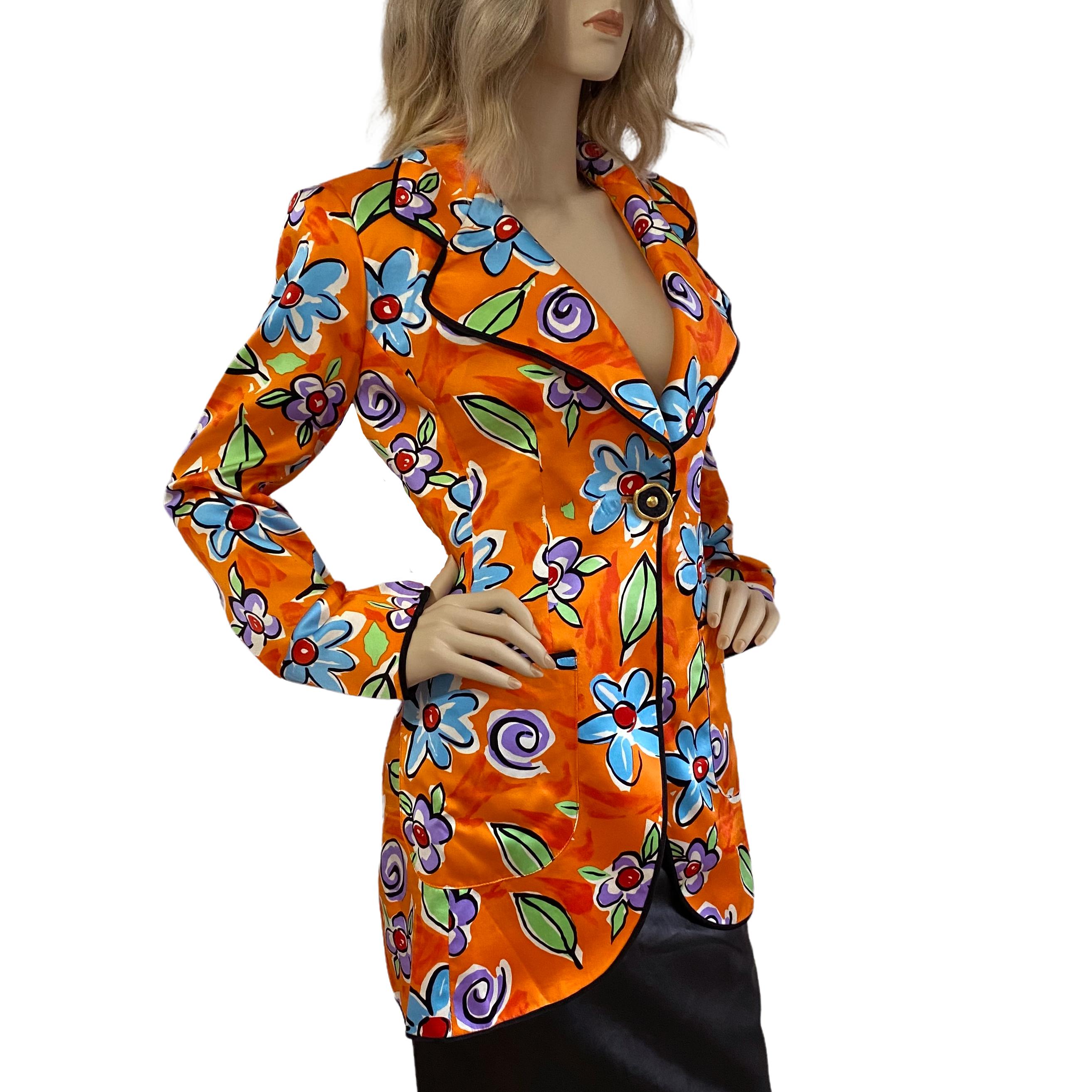 Be the chic showstopper in this FLORA KUNG one-off piece.
Silk binding frames the wide lapel and shaped hem.  Two pockets also with black binding..
Triple Duchess Satin made with long filament, finest silk.
Printed with Flora's floral print on