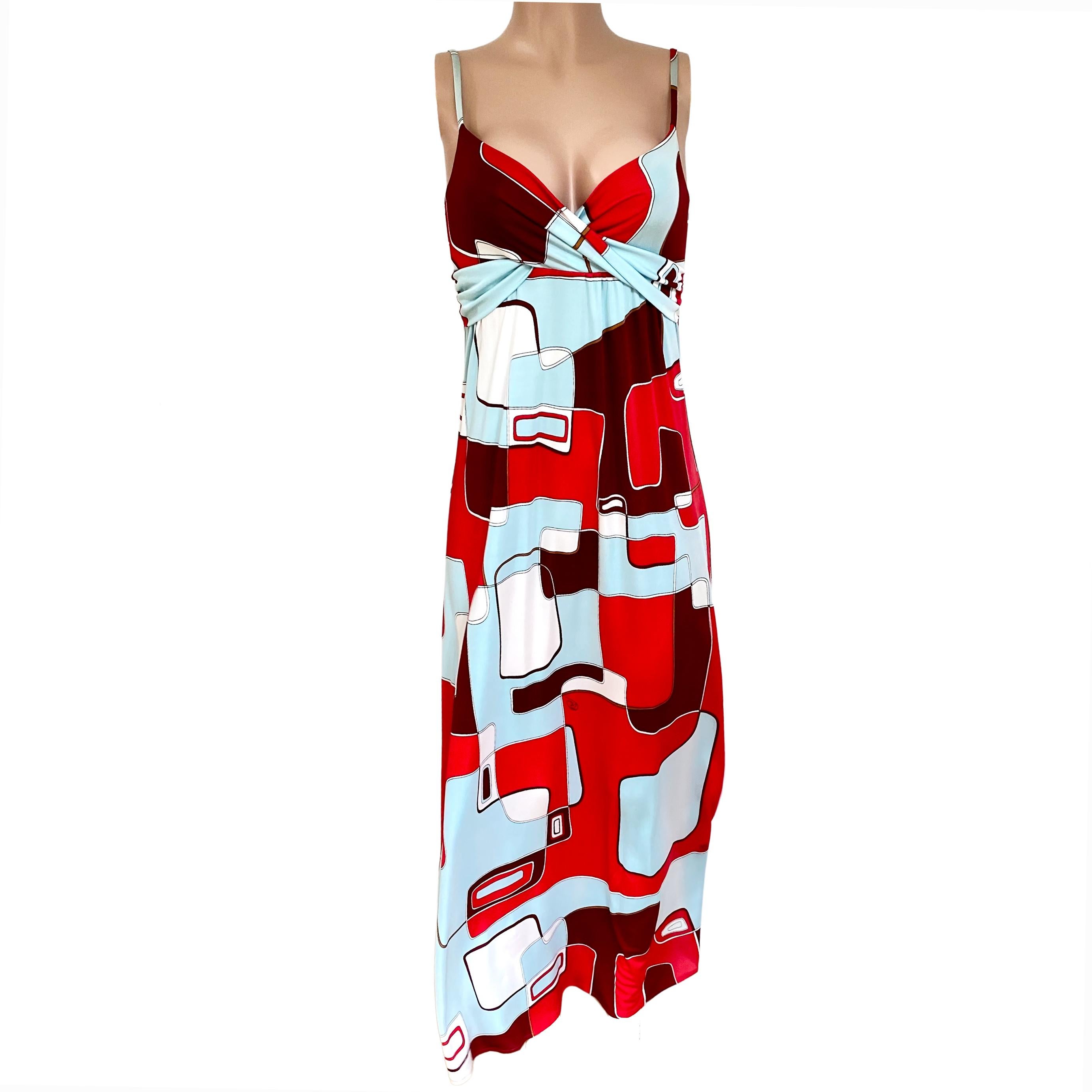 Abstract red aqua print silk jersey boho maxi dress
Original freehand signed print from Flora Kung.

To learn more about Flora the designer and read her blog on fashion anecdotes, go to her newly revamped website.
FLORA KUNG silk dresses are made in