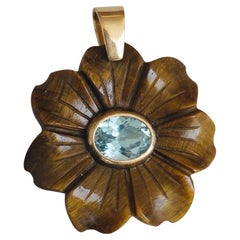 FLORA Pendant : Tigers Eye Flower with Sky Blue Topaz and 14k Gold