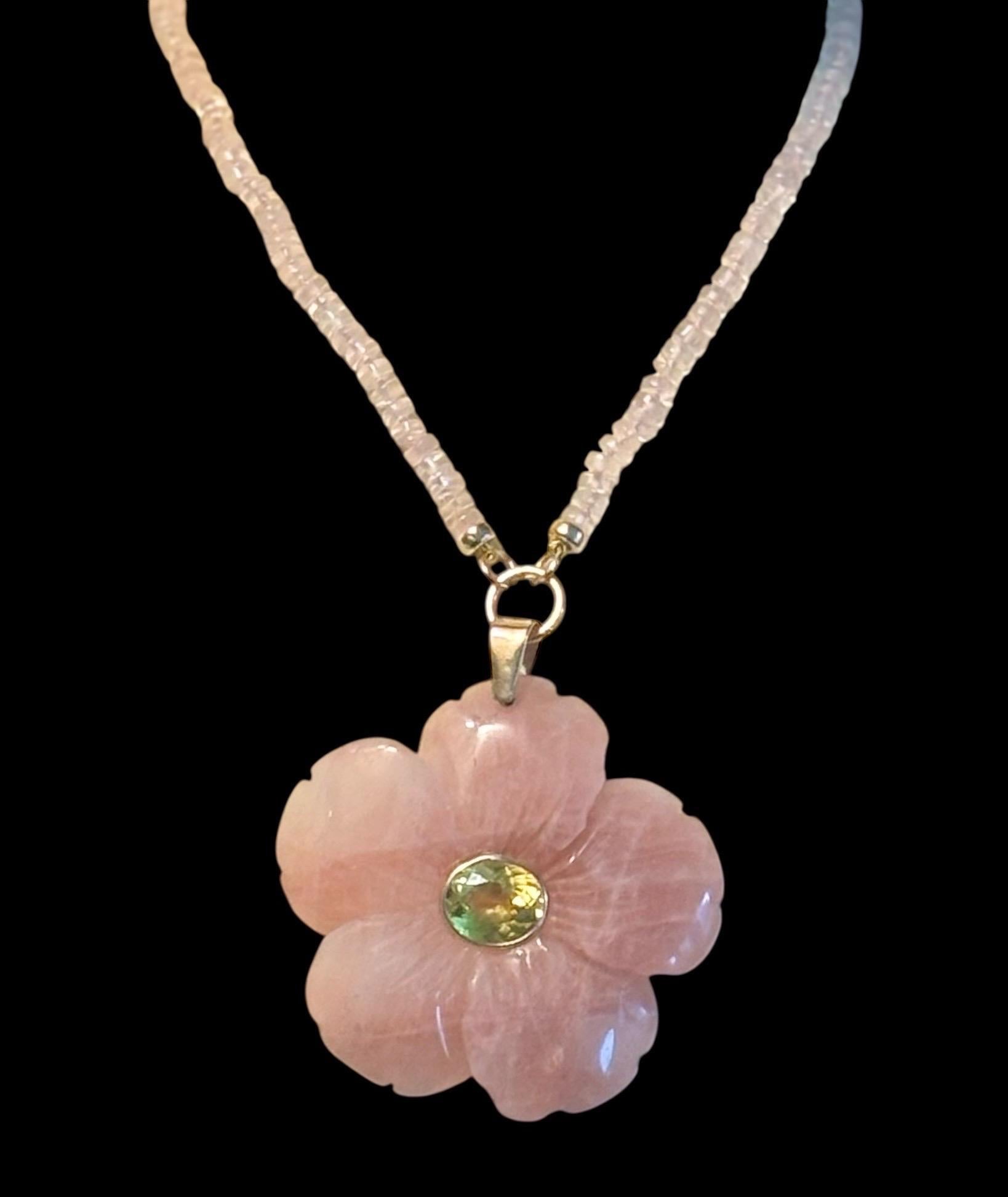 FLORA PENDANT

Rose Quartz, Citrine, 14k Gold

Carved Rose Quartz flower (2.5