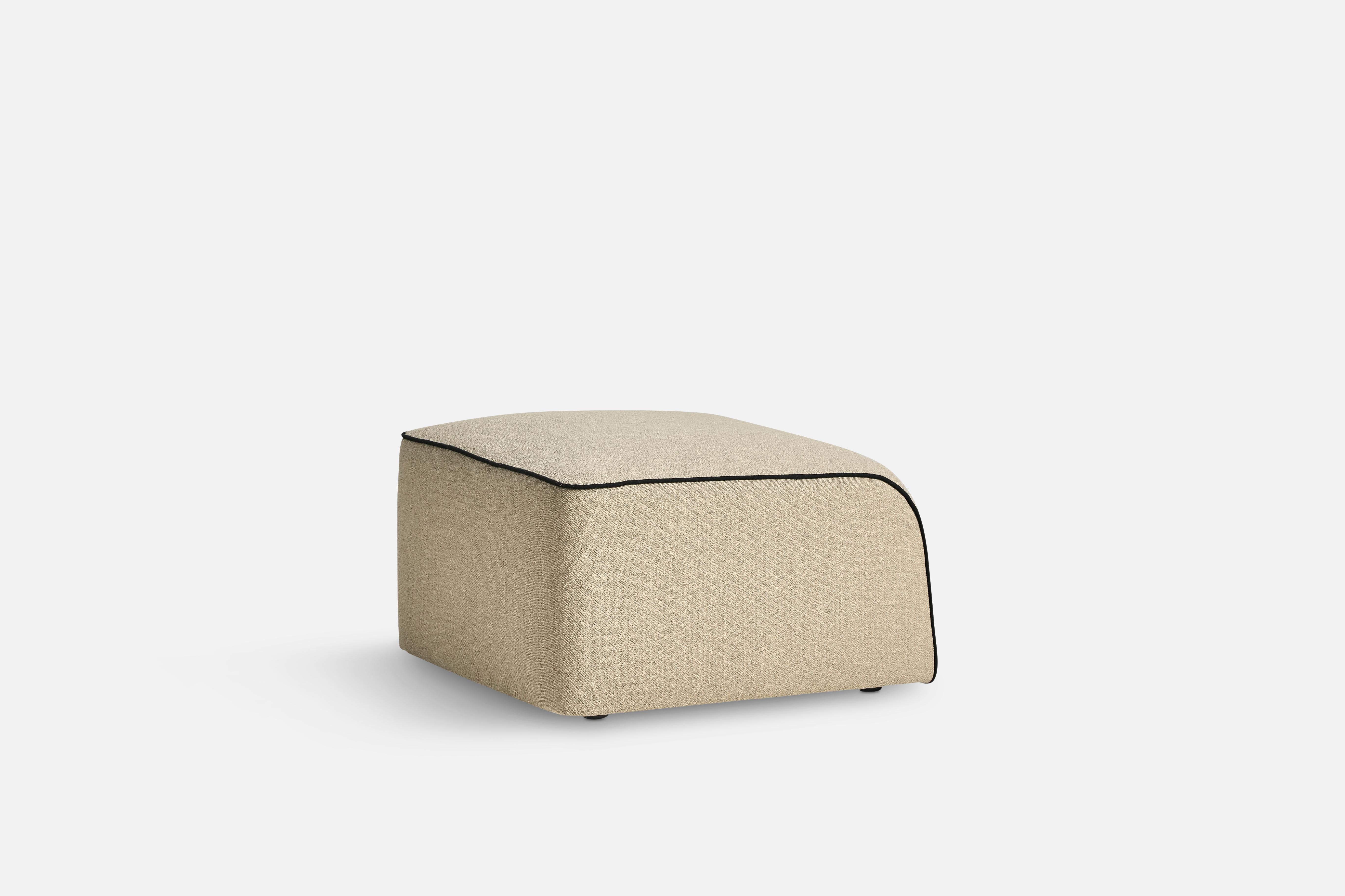 Flora Pouf by Yonoh.
Materials: Plywood, foam, webbing, wood, fabric (Kvadrat Vidar 0323).
Dimensions: D 66 x W 70 x H 43 cm.
Also available in different colours and materials.

The founders, Mia and Torben Koed, decided to put their 30 years