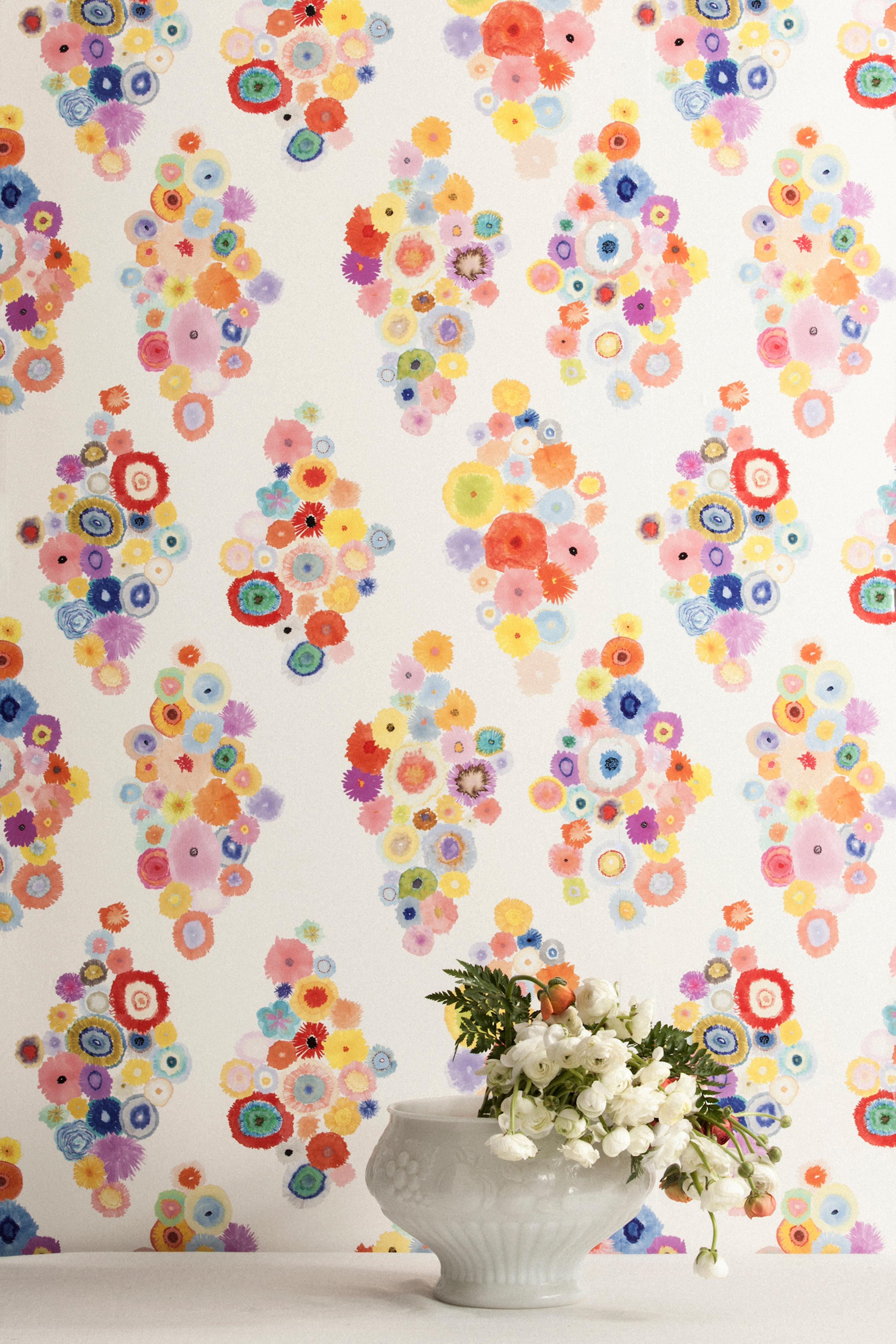 Dreamy watercolor floral that breathe life into any room. A dash of potent Chroma helps this wallpaper stray from the saccharine. Flora is printed with multicolored inks on white paper. It is also washable, strippable, unpasted, and Class A fire