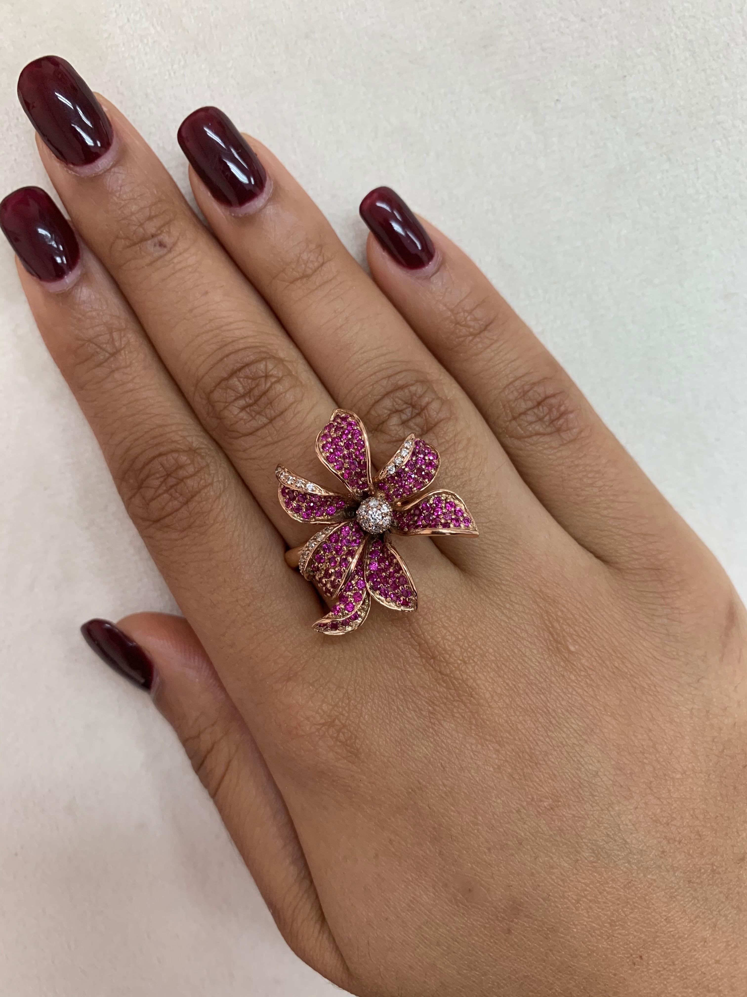 Glamorous Gemstones - Sunita Nahata started off her career as a gemstone trader, and this particular collection reflects her love for multi-colored semi-precious gemstones. This ring presents a floral ruby with white diamond detailing.  These gems