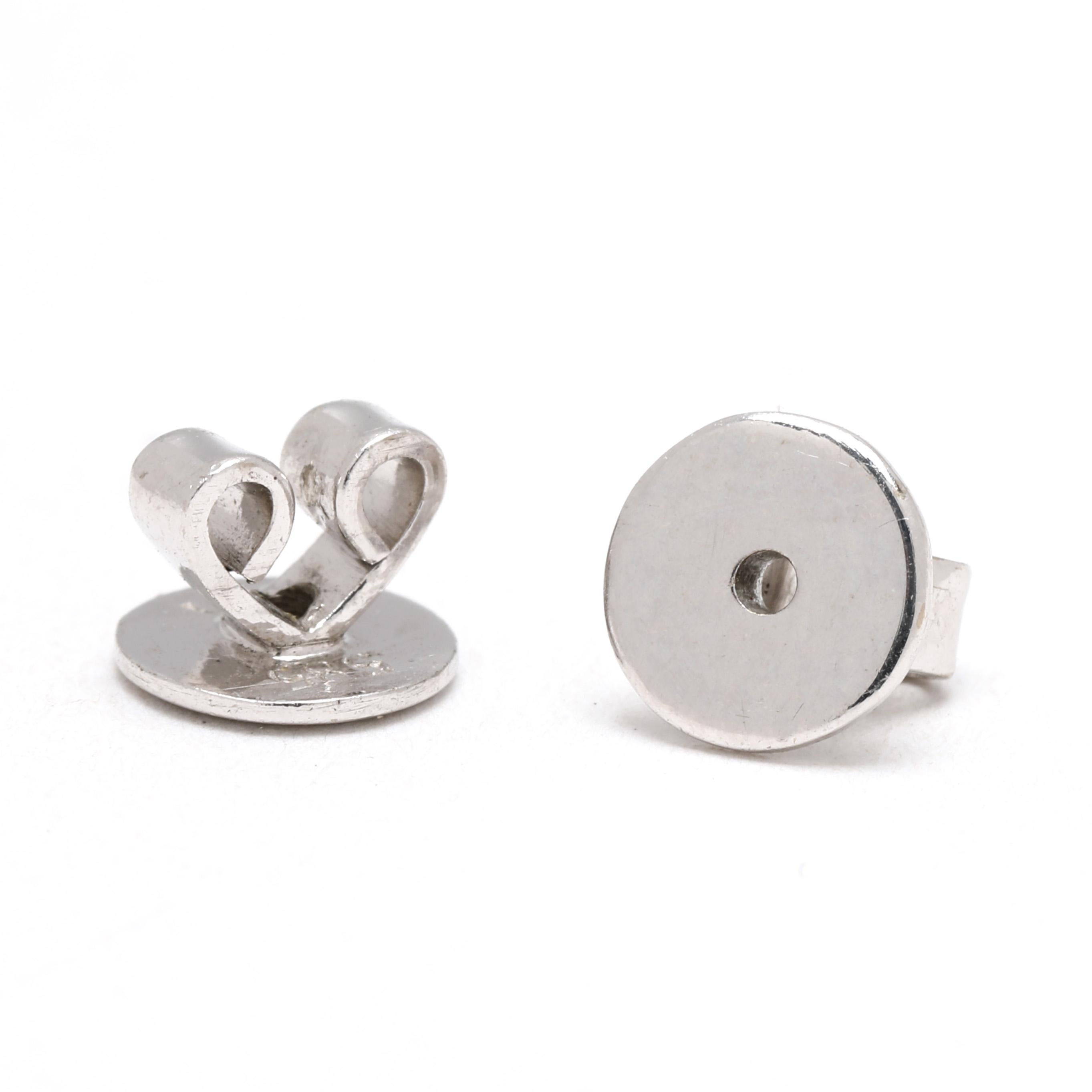 Taille ovale Boucles d'oreilles fleurs en or blanc 14k, diamant et rubis .75ctw en vente