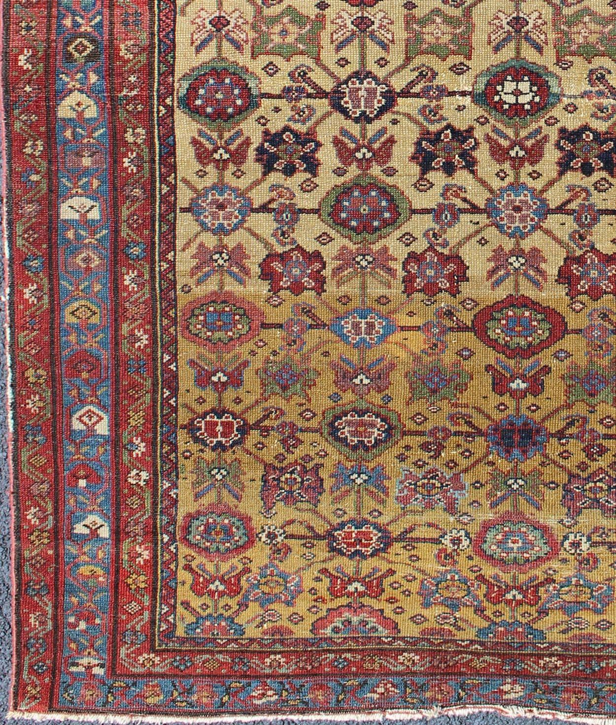 All Over Geometric Antique Persian Malayer Rug in Yellow, Red, Blue, Green,
rug 18-0404, country of origin / type: Iran / Malayer, circa 1910. This beautiful antique early 20th century Persian Malayer carpet features an all-over design of repeating