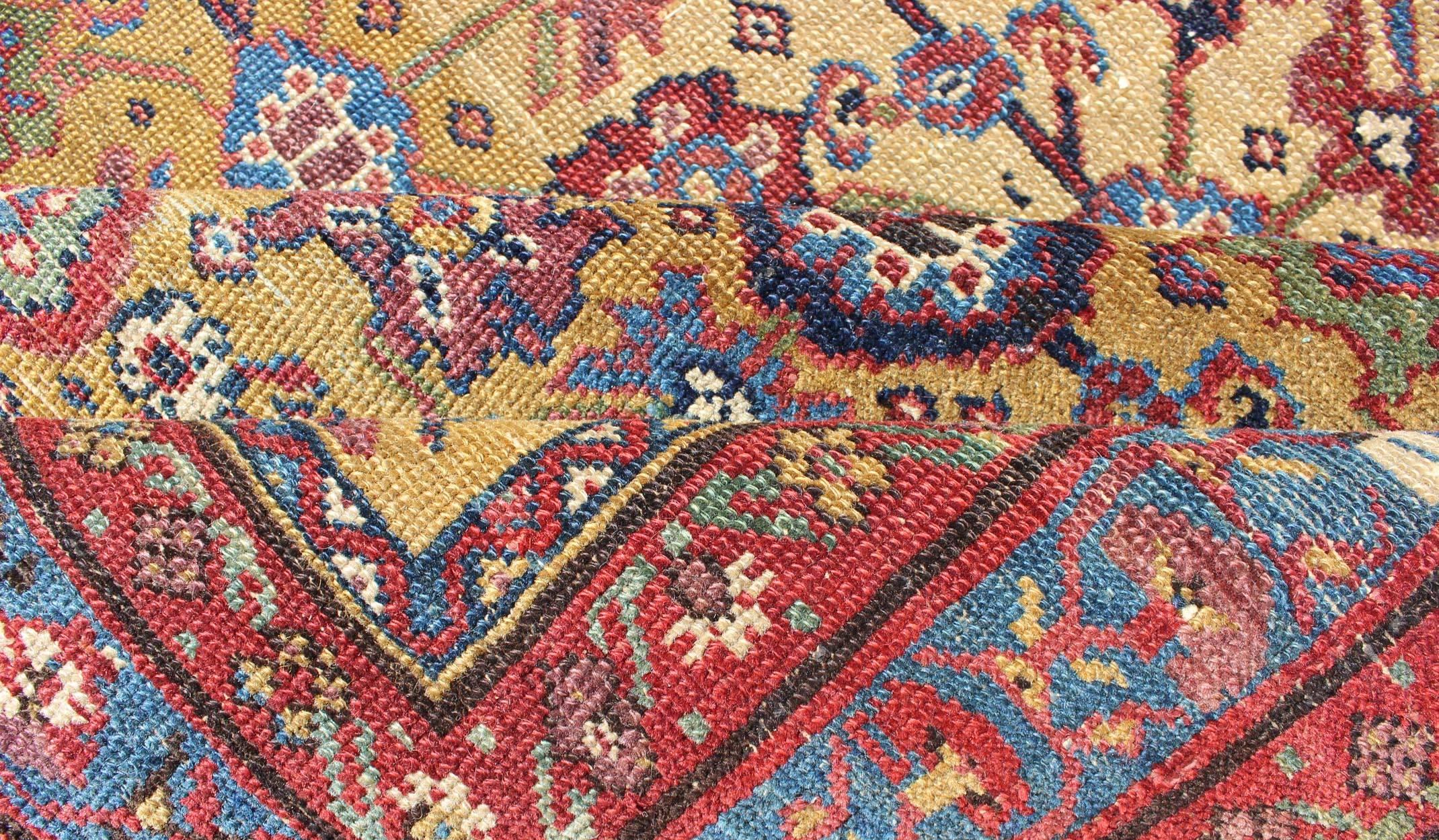Early 20th Century All Over Geometric Antique Persian Malayer Rug in Yellow, Red, Blue, Green For Sale