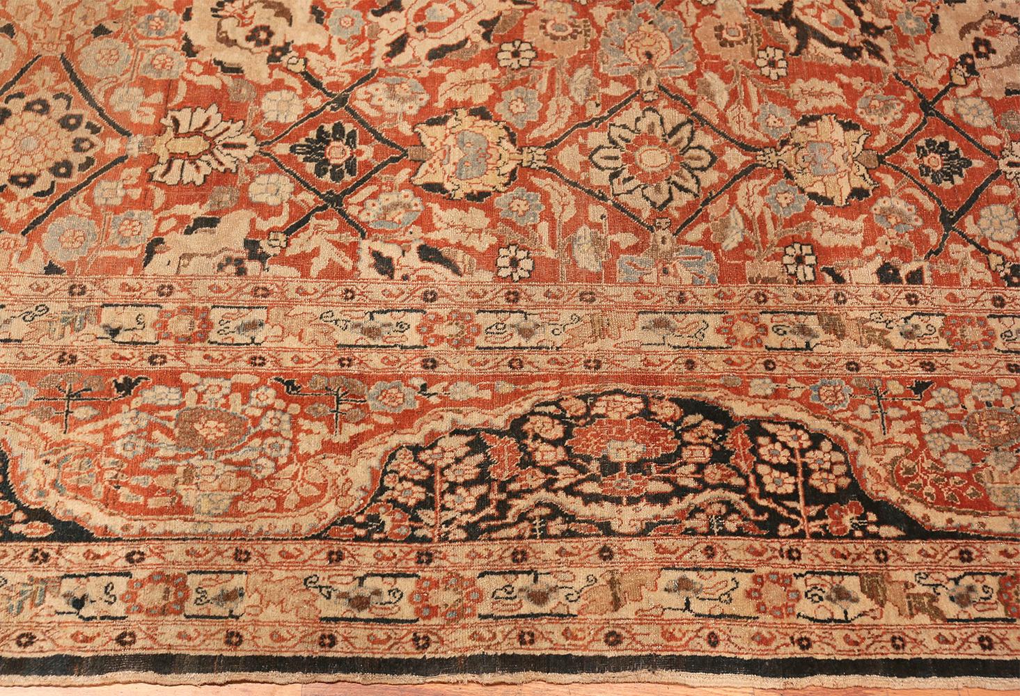 Breathtaking floral antique Persian Tabriz rug, country of origin / rug type: Persian rugs, date circa 1900. Size: 9 ft. 3 in x 13 ft. 2 in (2.82 m x 4.01 m).