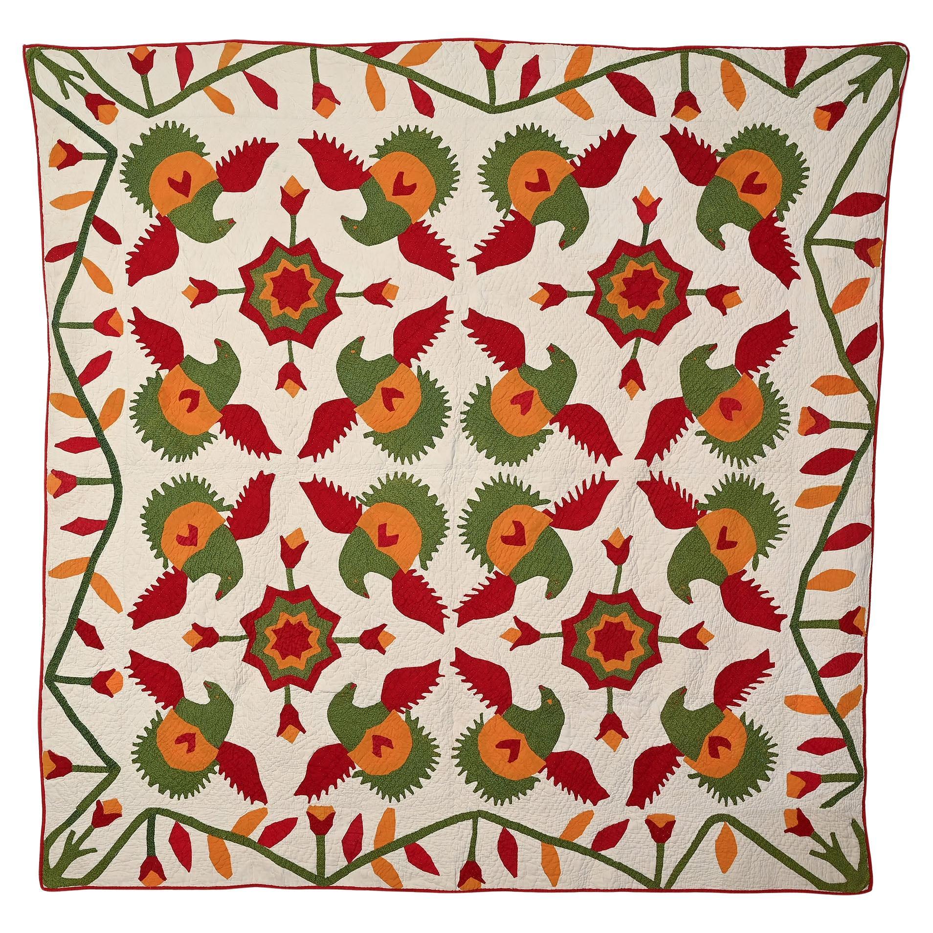 Colcha de apliques florales con águilas