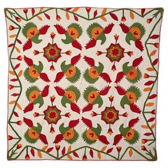 Quilt con applique floreali e aquile