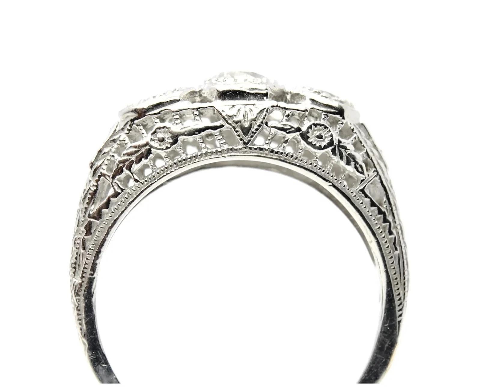 Floral Art Deco 0.80ctw Three Stone Diamond Ring in 18K White Gold In Good Condition For Sale In Boston, MA