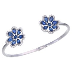 Bracciale floreale con zaffiri blu a forma di pera e diamanti 14K