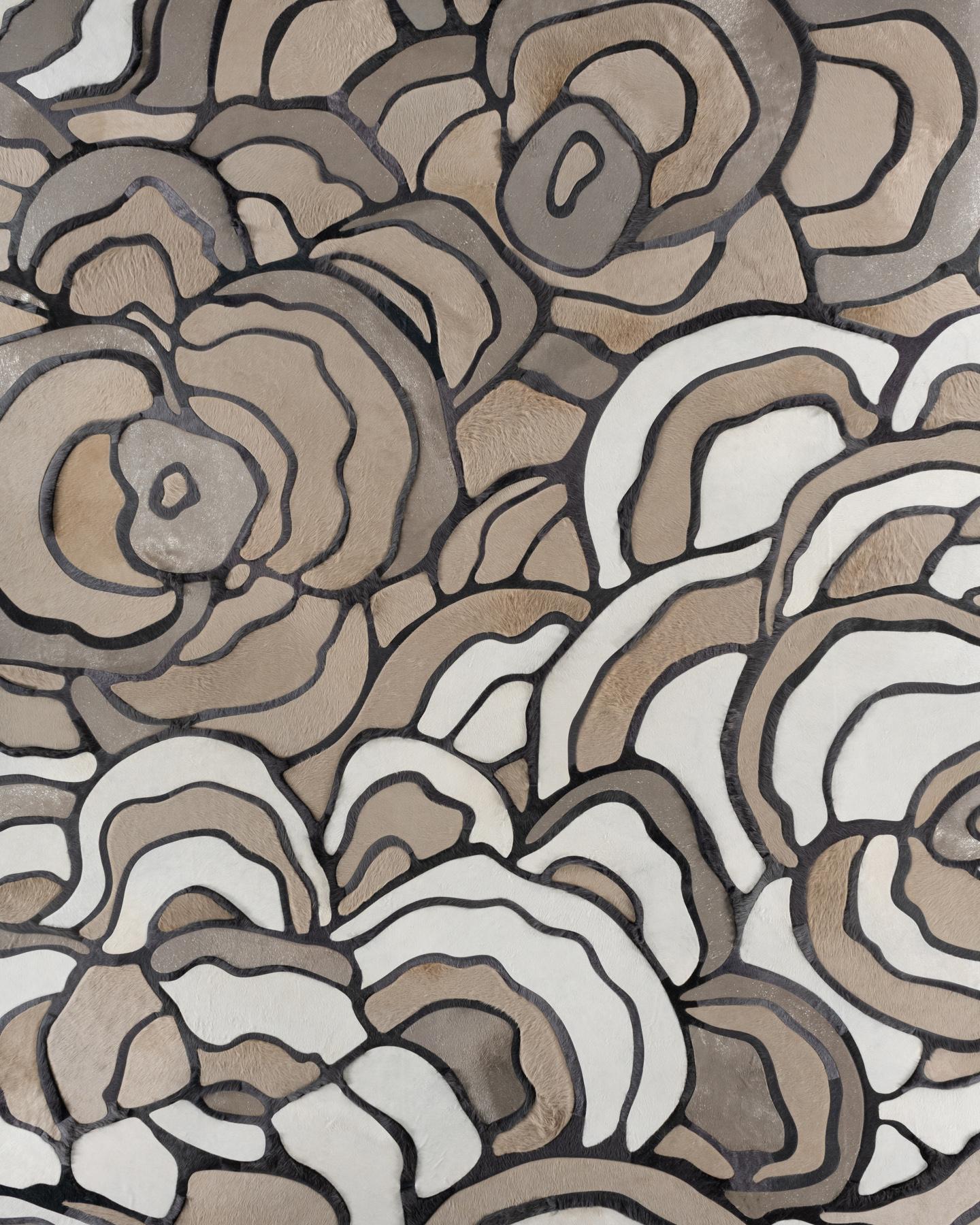 This Bloom Hide Rug was designed in collaboration between Kyle Bunting and Interior Designer Marc Thee for their 2018 rug collection. 

About the Design:
The lush, overlapping blossoms of Bloom, harnessed only by the border that surrounds them,