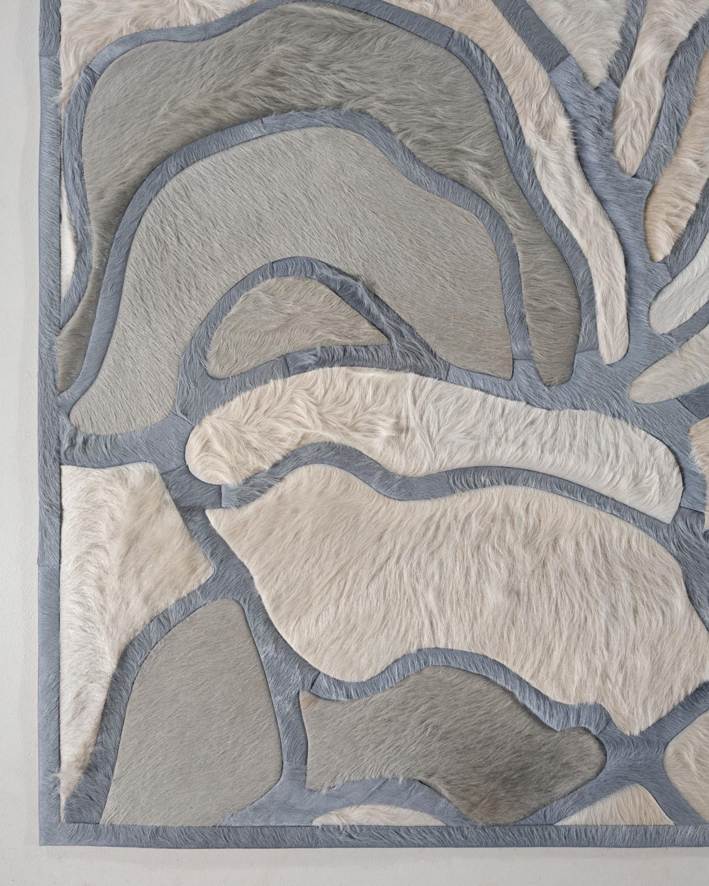 This Bloom Hide Rug was designed in collaboration between Kyle Bunting and Interior Designer Marc Thee for their 2018 rug collection. 

About the Design:
The lush, overlapping blossoms of Bloom, harnessed only by the border that surrounds them,