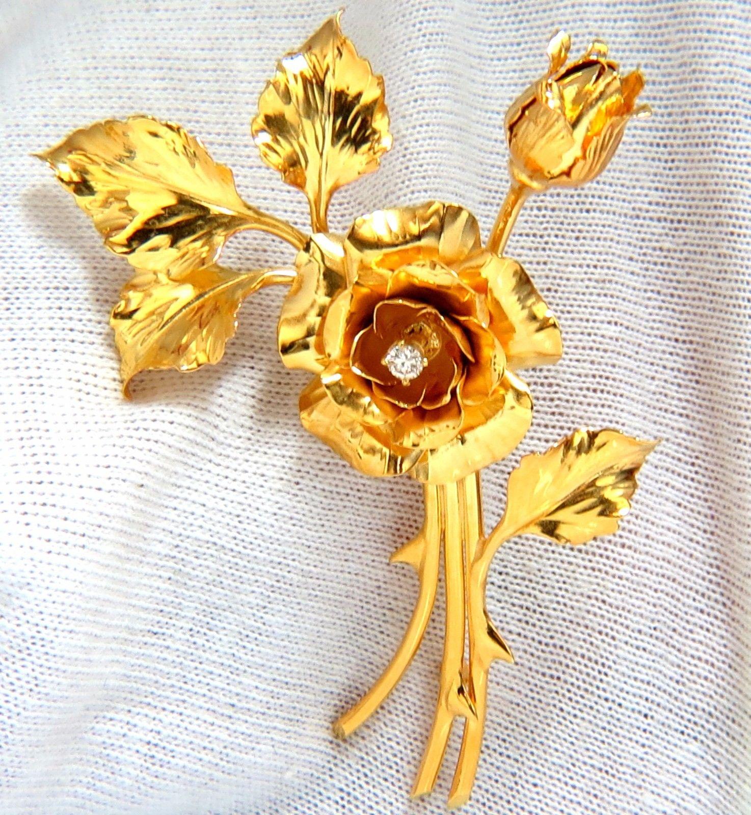Floral Bundle Brooch Pin

 .15ct natural diamond.

Rounds, Full cut Brilliant.

G-color VS-2 clarity.

14kt yellow gold 

intricate detail of flowers

17.5 grams.

Overall: 2.3 X 1.5 inch