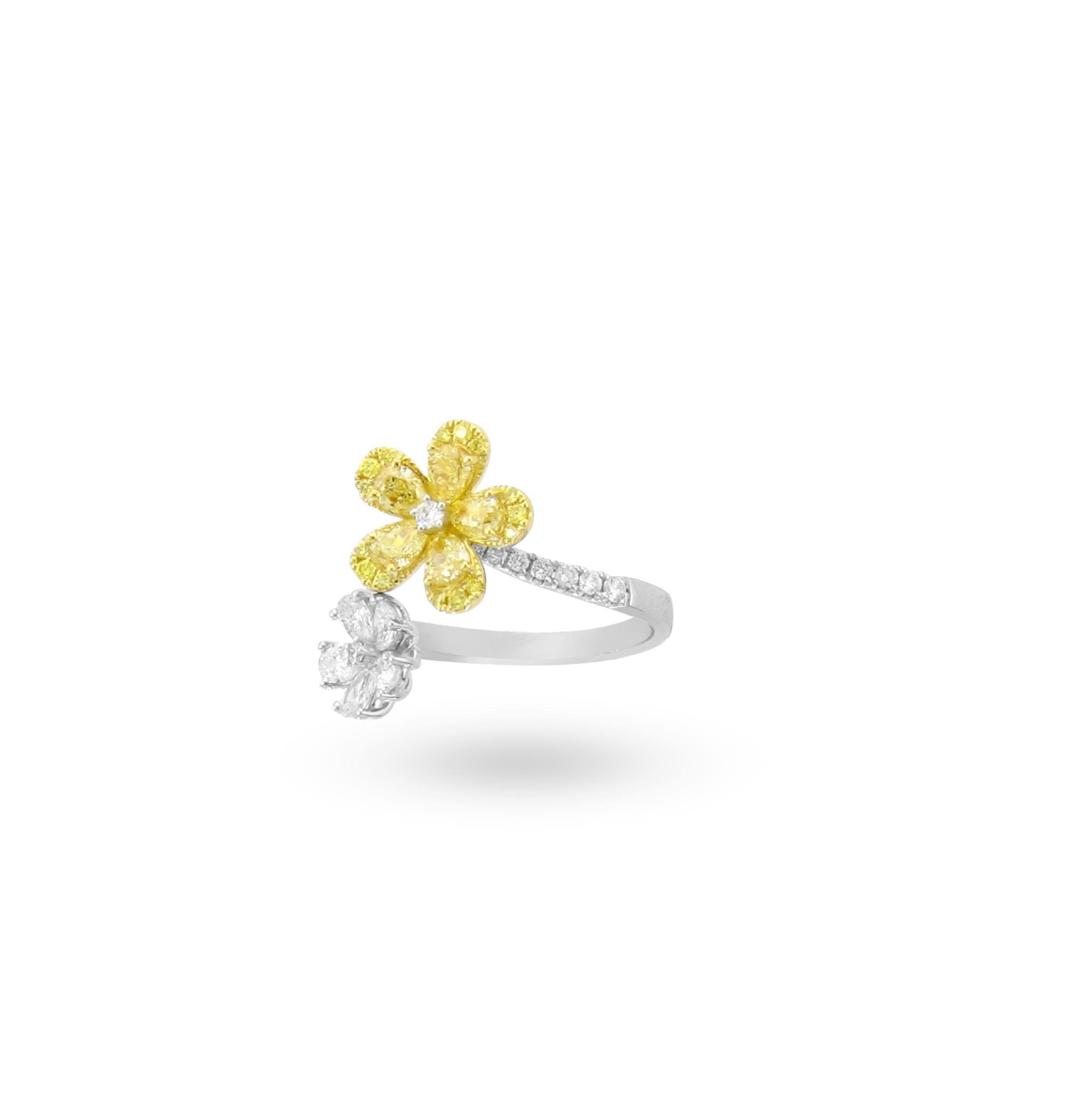 From one of Bleau NY's most unique set, a Bypass Ring with Natural Yellow Diamonds and White Diamonds. Pear cuts and Round cuts.

Yellow Natural Diamonds - 1.00ct
White Diamonds - .72ct
Ring Metal - 18kyw
Tag #12020