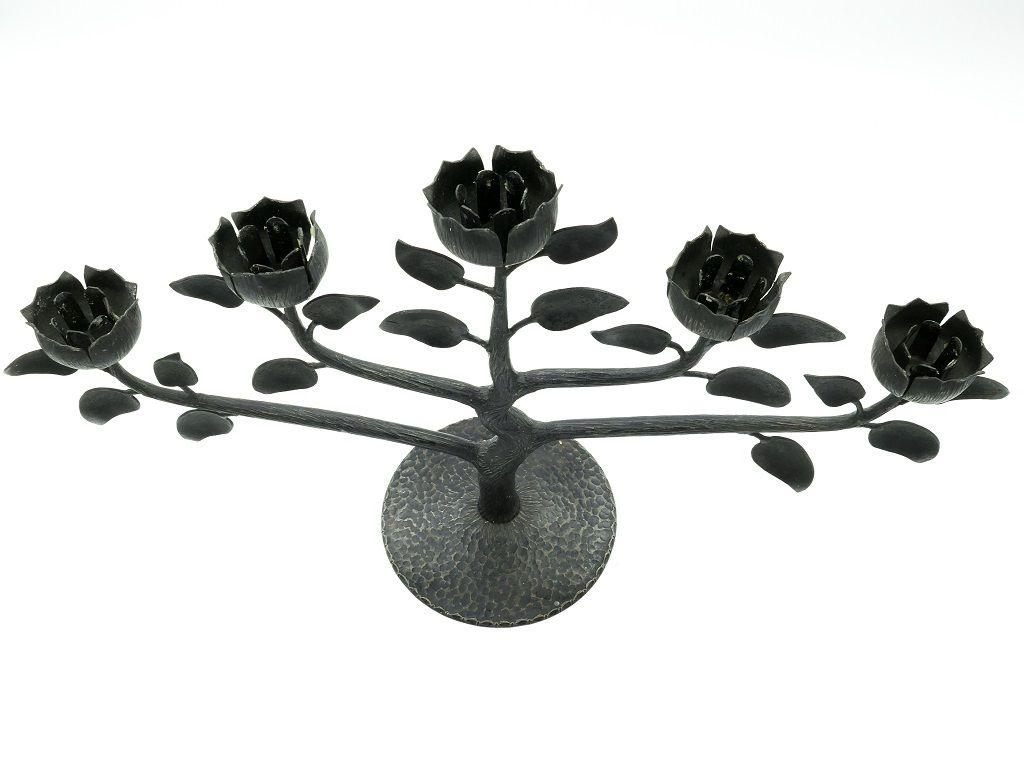Floral candleholder is a beautiful candleholder, iron made.

Black painted with five arms with rose shaped. 

Northern Europe manufacture, mid-20th century.

Excellent condition.

This object is shipped from Italy. Under existing legislation, any