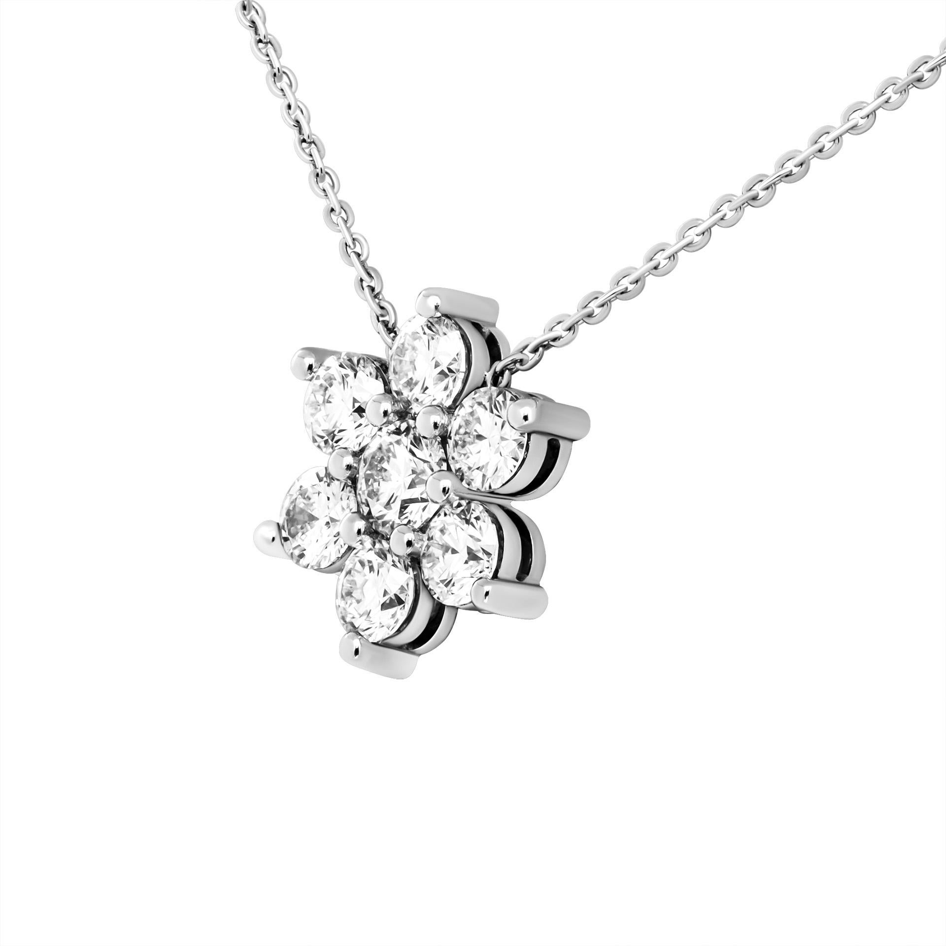 Floral Cluster Diamond Necklace in Platinum

7 Round Brilliants totaling 1ct F/G Color & VS clarity
Platinum chain 16