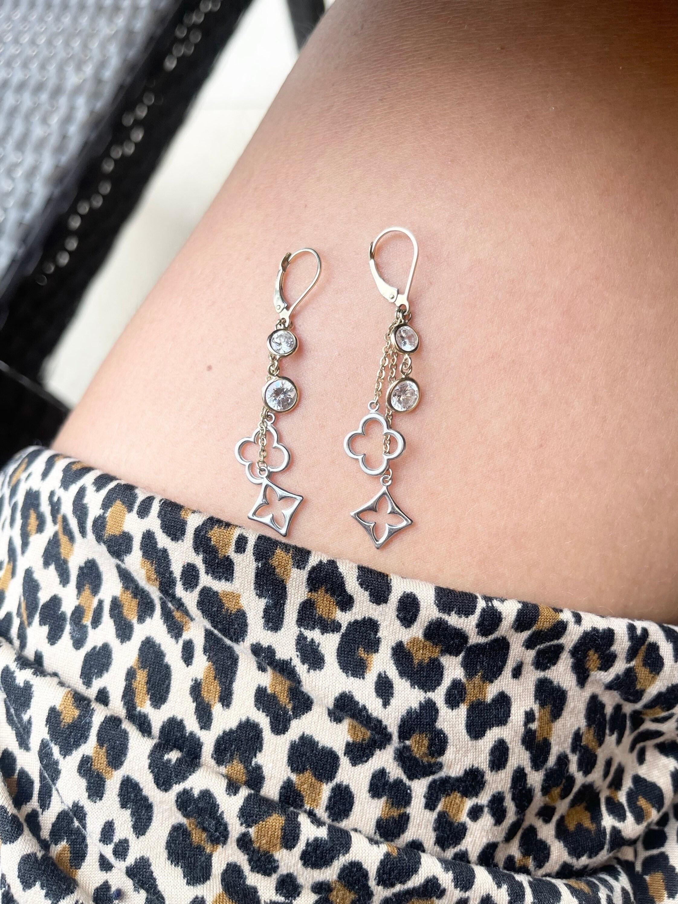 Moissanite stunning dangling earrings 14KT yellow and white gold, look and sparkle just like diamonds!!! So stunning! Earrings about about 1.50 inches long.

*Item will come with a beautiful packaging and certificate of authenticity from laboratory