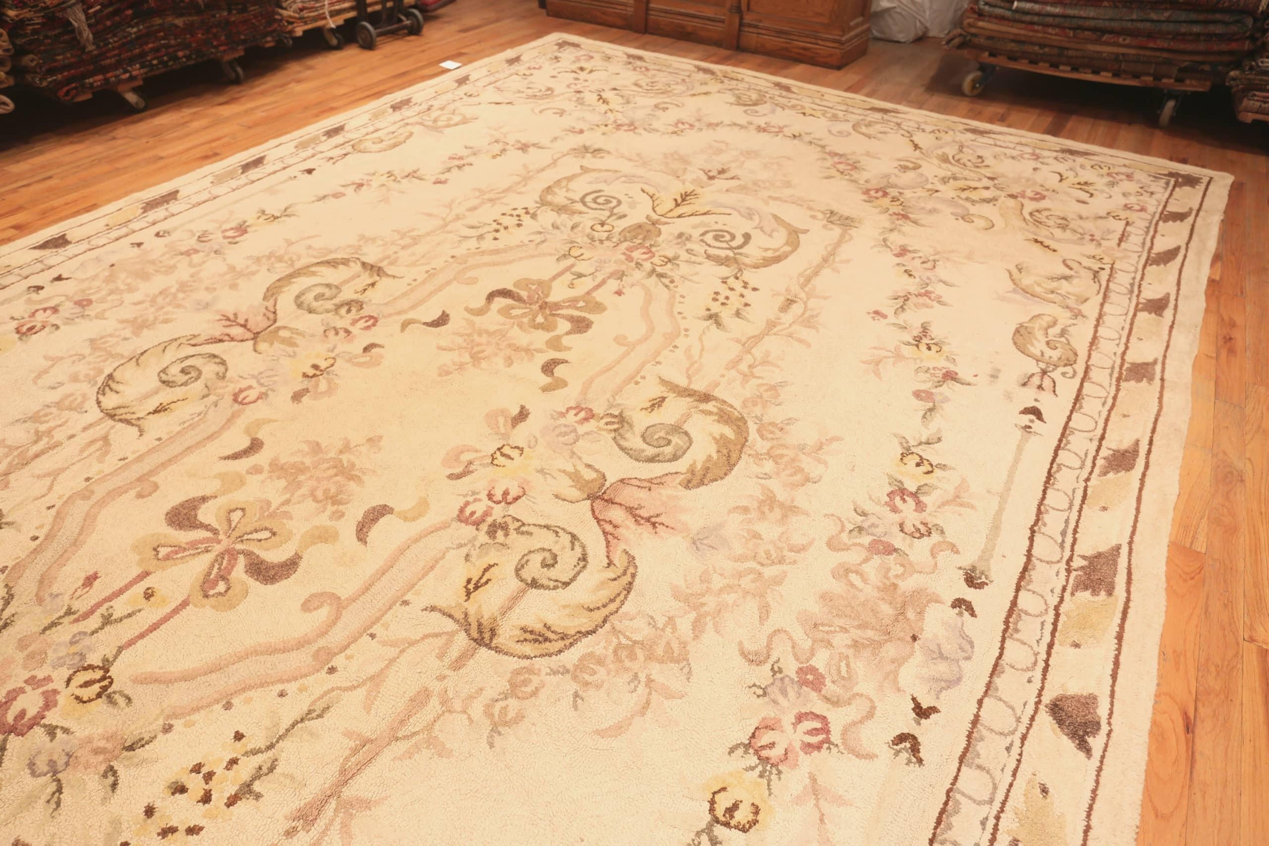 A Beautiful Floral Design Antique Ivory Oversized American Hooked Rug, Country of Origin: United States, Circa 1920’s