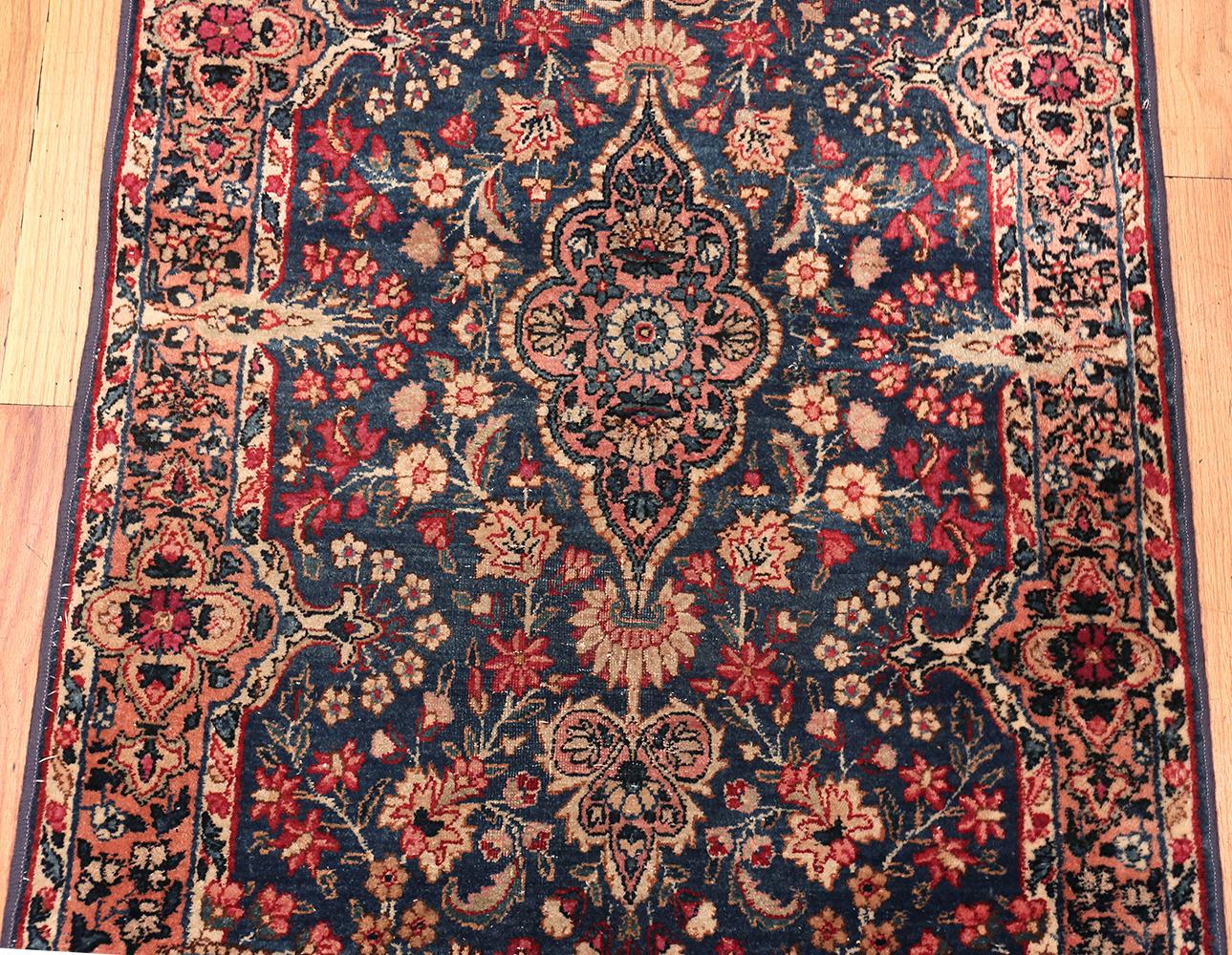 Hand-Knotted Floral Design Antique Persian Kerman Runner Rug. Size: 2 ft 6 in x 25 ft 6 in