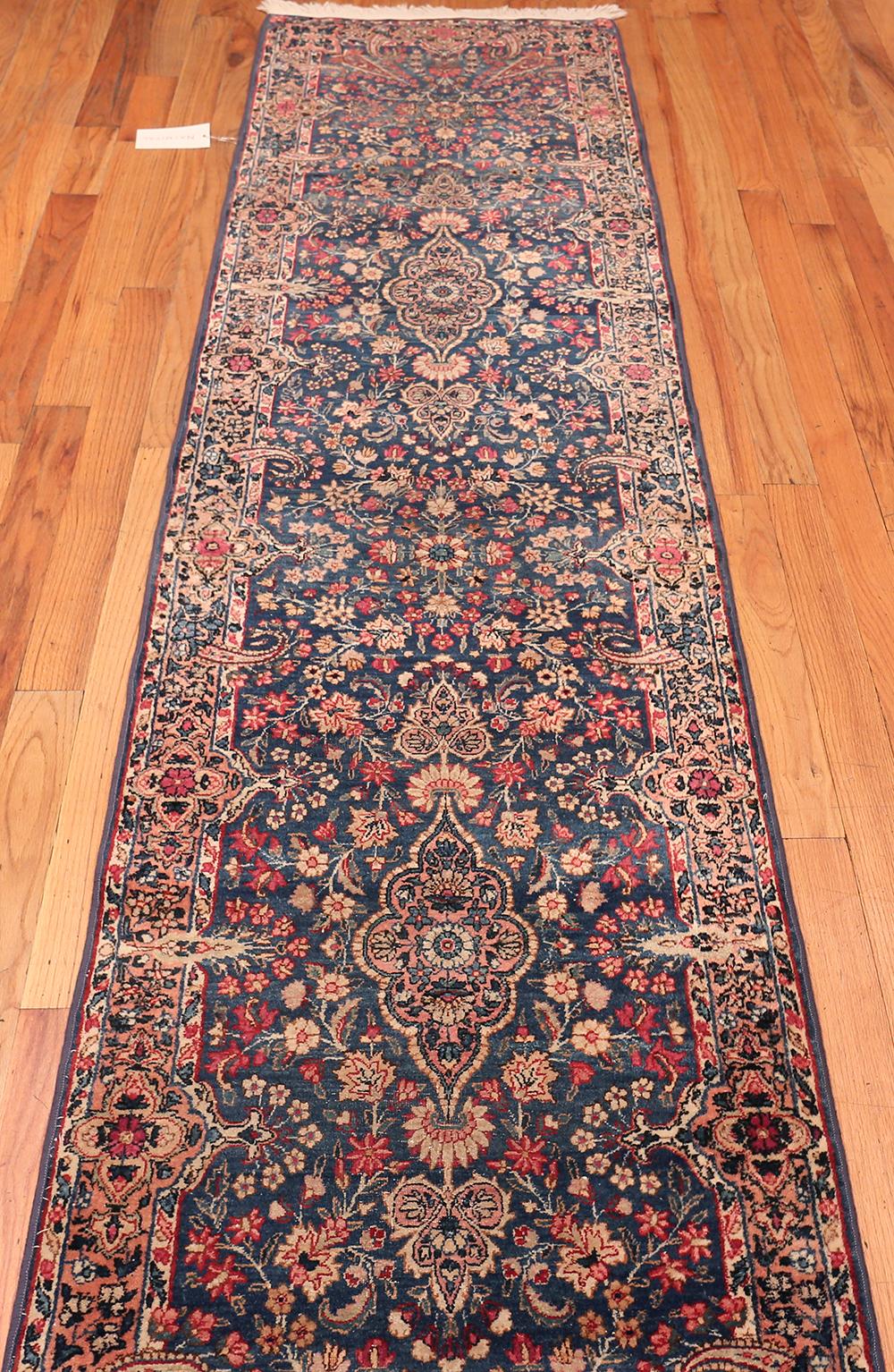 Wool Floral Design Antique Persian Kerman Runner Rug. Size: 2 ft 6 in x 25 ft 6 in