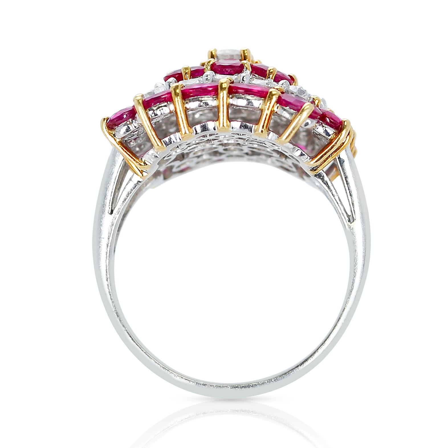 A Floral-Design Round 4.19 carats of Ruby and 1.50 carats of Diamond Ring made in Platinum & 18 Karat Yellow Gold. The total weight of the ring is 10.90 grams. The Ring Size is US 8.25. 

 
