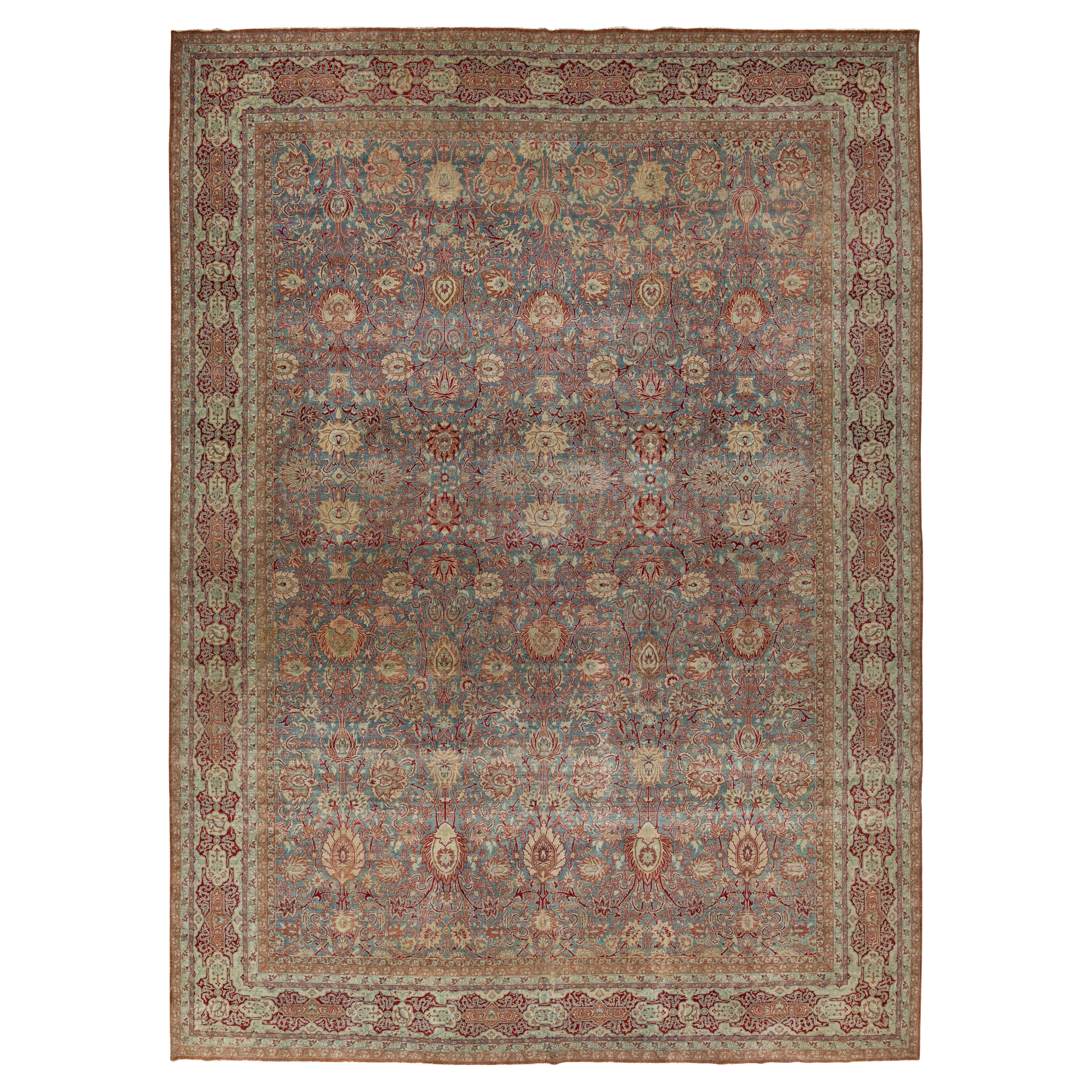 Floral gestaltete antike persische Malayer Wollteppich in blau aus den 1890er Jahren