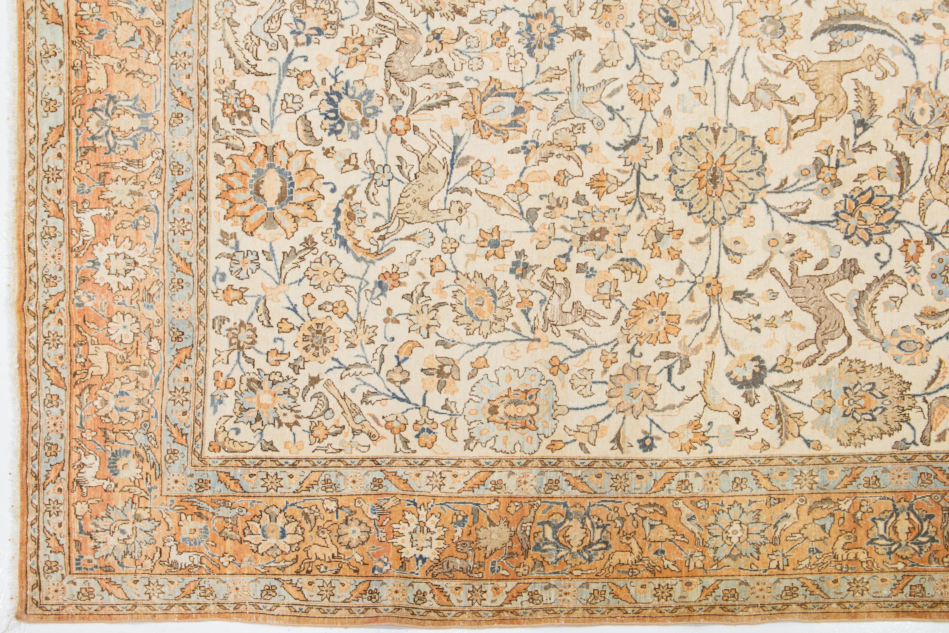 20th Century Floral Designed Antique Persian Tabriz Wool Rug Handmade In Beige and Orange For Sale