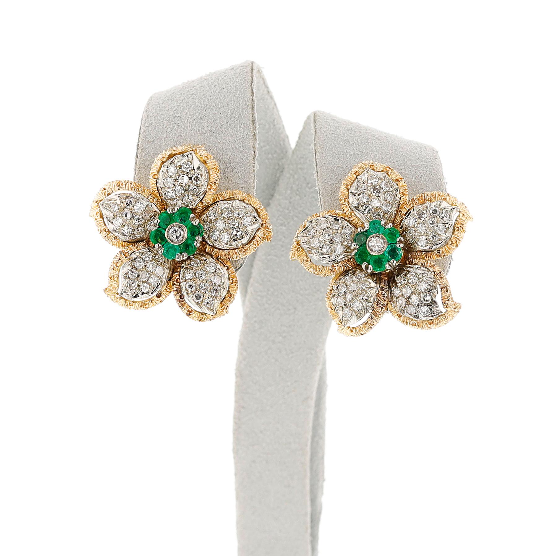 A Floral Diamond and Emerald Earring, Ring, Pendant Set made in 18k yellow gold.

The pendant is 1 inch x 3/4 inch, the weight is 6.74 grams. and the diamond weight is appx. 0.79 cts. Pendant Chain not included. 

The ring is 1 1/8