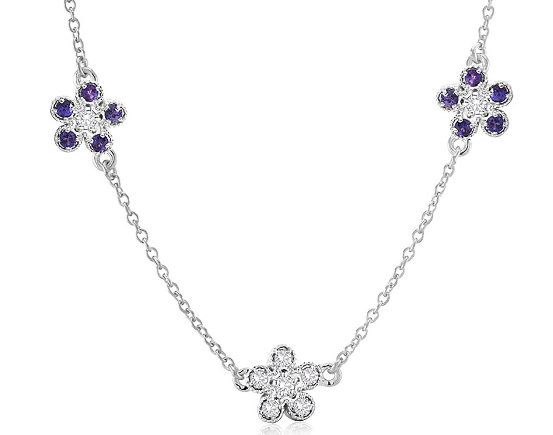 Fourteen karat white gold necklace pendant with three floral diamond and sapphire charms 
Diamond weighing 0.41 carat
Sapphire weighing 0.45 carat
Measuring 18 inches long
Thin cable chain necklace with spring lock: a lock that fastens with spring