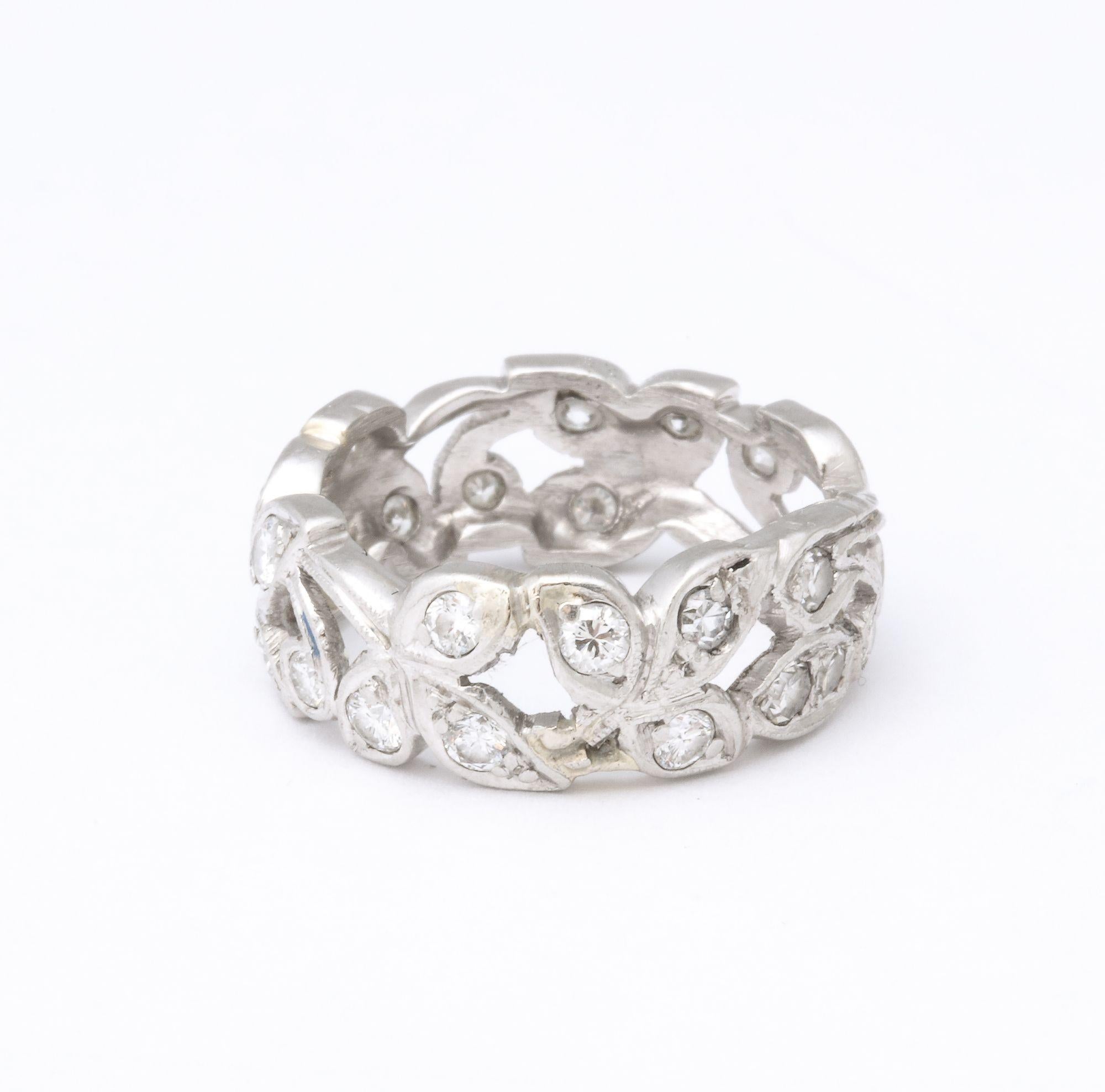A stunning Platinum Band in a floral pattern with old mine diamonds