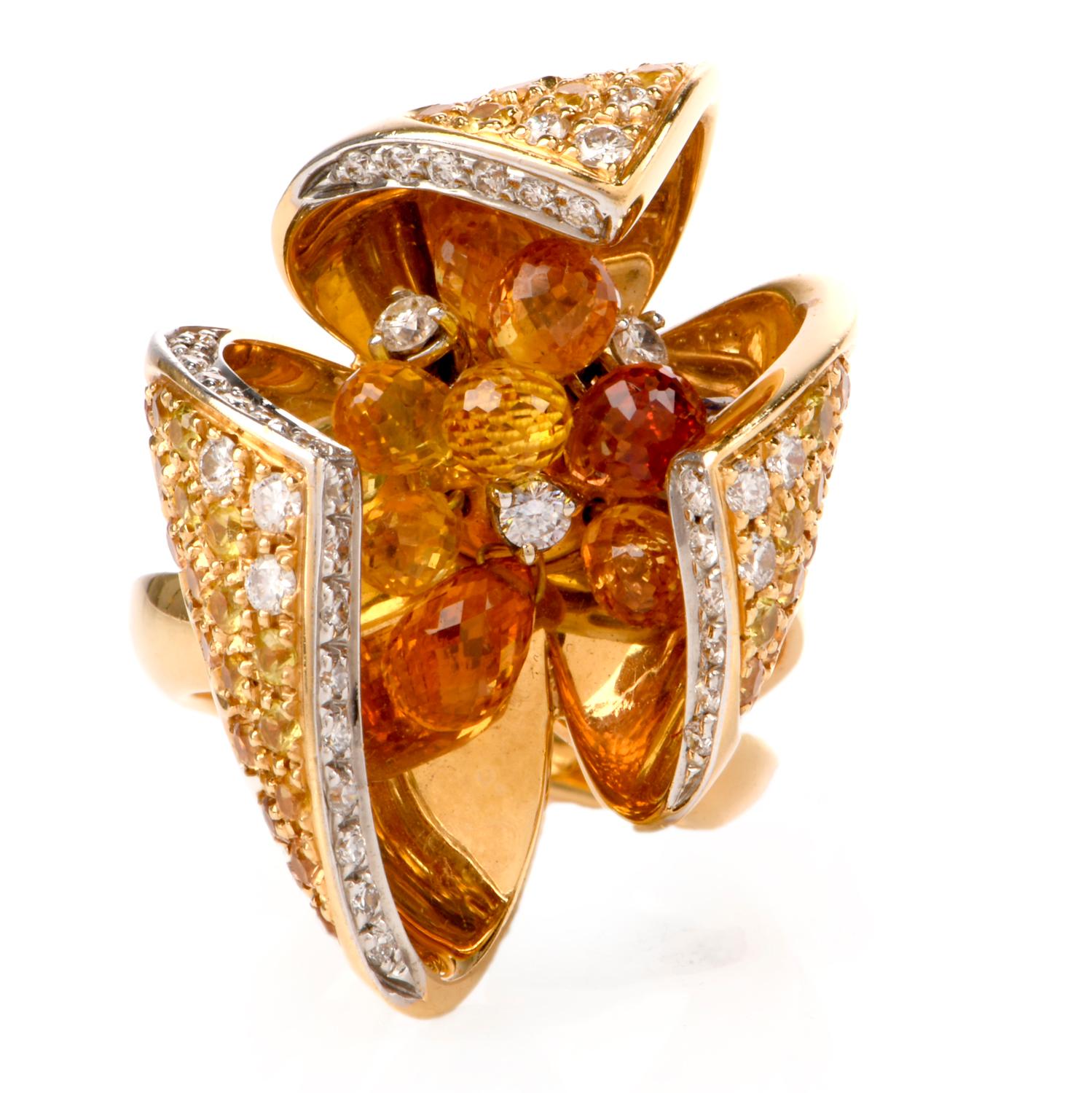 This limited-edition designer diamond and yellow sapphires cocktail ring is crafted in 18-karat yellow gold, weighing 22.5 grams and measuring 30mm x 15mm high. Ring simulate three petal flower-heads, the inner edges of the ‘petals’ are pave-set