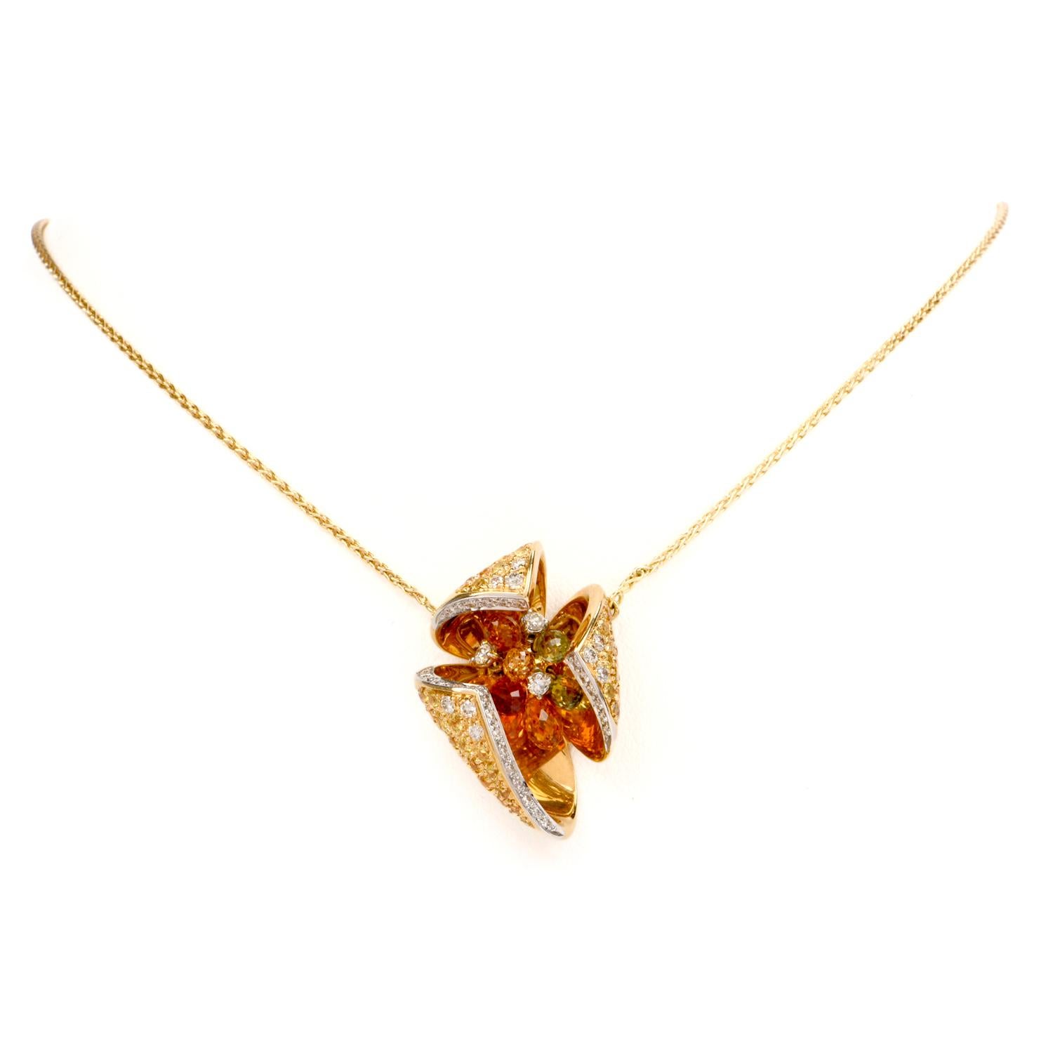 This limited-edition designer diamonds and yellow sapphires pendant necklace are crafted in 18-karat yellow gold, weighing 19.4 grams and measuring 16.50 inches long. Necklace pendant simulate three petal flowerheads, the inner edges of the ‘petals’