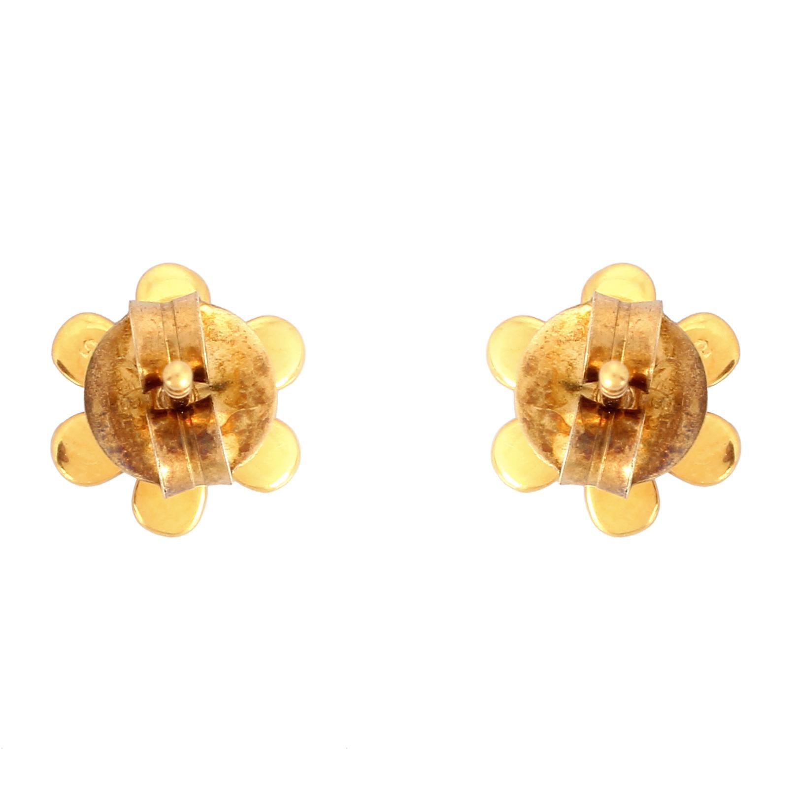 Cast from 18-karat and sterling silver, these beautiful floral stud earrings are hand set with .22 carats of sparkling diamonds. Complimentary conversion to clip-on earrings is available.

FOLLOW  MEGHNA JEWELS storefront to view the latest