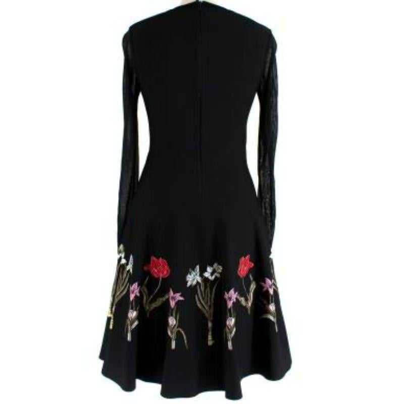 Oscar de La Renta Floral Embroidered Dress with Sheer Sleeves
 
 
 
 -Zip fastening along the back 
 
 -Thin sheer sleeves 
 
 -Round neckline 
 
 -Flared and pleated at the waist 
 
 -Mid-weight with slight stretch 
 
 -Floral print detail 
 
 
 
