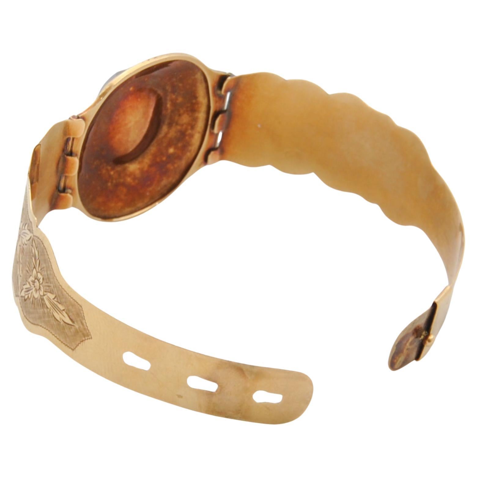 Artisan Floral Engraved Gold and Garnet Antique Bracelet For Sale