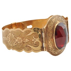 Bracelet ancien gravé de fleurs en or et grenat