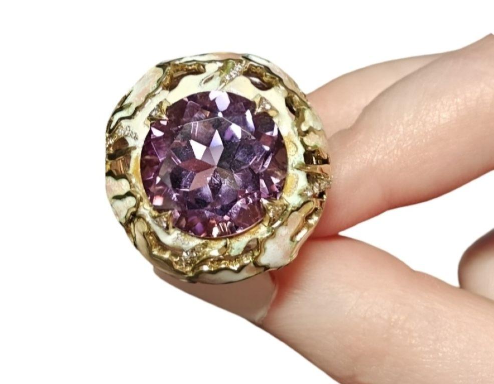 The Floral Fantasy Ring from the Stone Garden Collection by Konforti Jewelry is a collectible fine jewelry creation handcrafted in 18K yellow gold.

At its center rests a magnificent 32ct. ametrine, cut to reveal a natural transition of color that