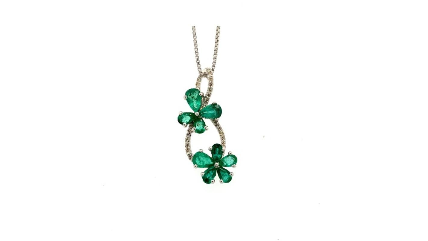 Floral Genuine Emerald Gemstone Pendant Necklace in sterling silver studded with pear cut Emrald and round cut diamonds. This stunning piece of jewelry instantly elevates a casual look or dressy outfit.
Emerald brings energy, calmness and happiness