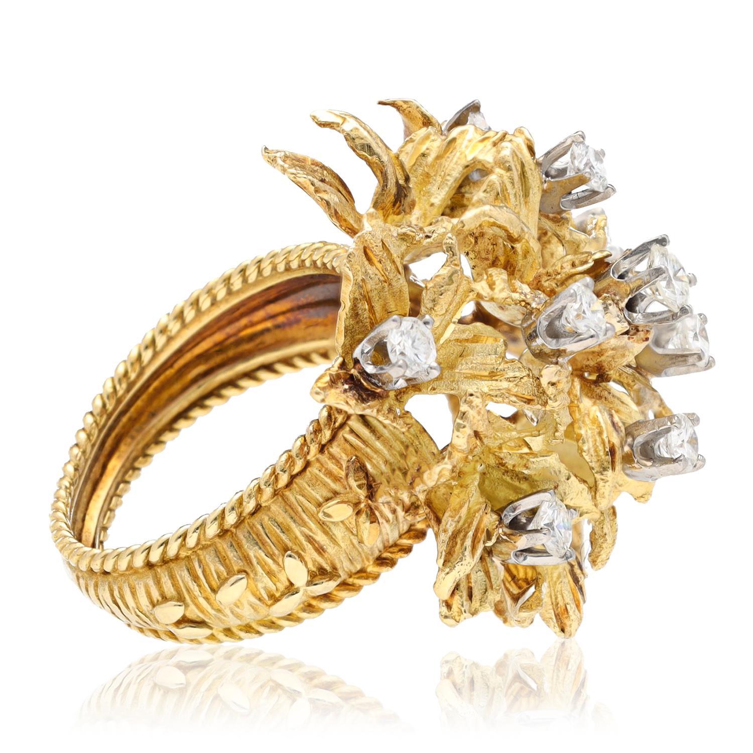 This exquisite ring captures the essence of nature's beauty through its intricate design and masterful craftsmanship. Fashioned in luxurious 18K yellow gold, the ring showcases a many-petaled flower, each petal meticulously textured to reflect the