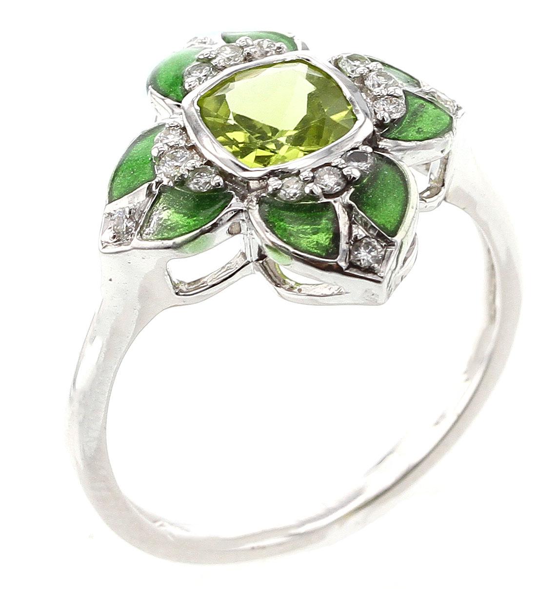 A clover-shape floral style Green Enamel Ring with a 0.81 ct. Peridot and 0.16 cts. of Diamonds. 14K White Gold.