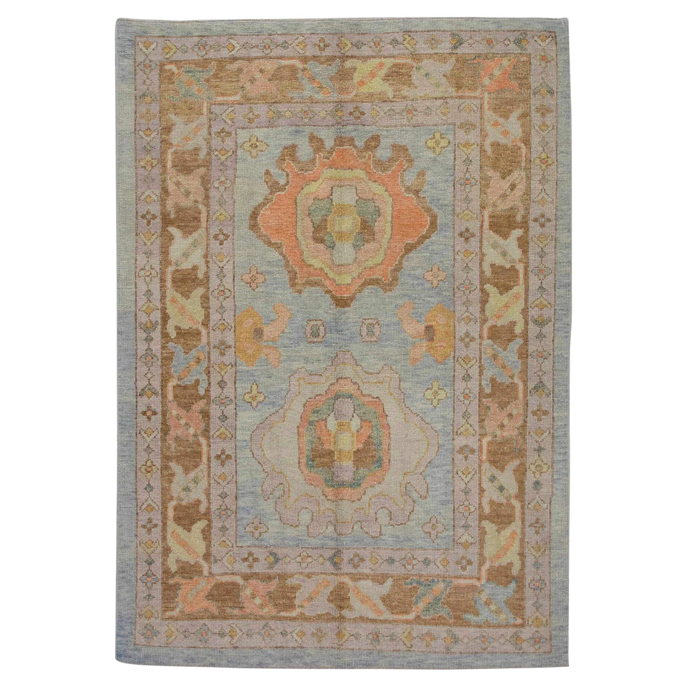 Tappeto Floral Oushak in lana turca intrecciata a mano in blu cielo, marrone e arancione 5' x 6'9"