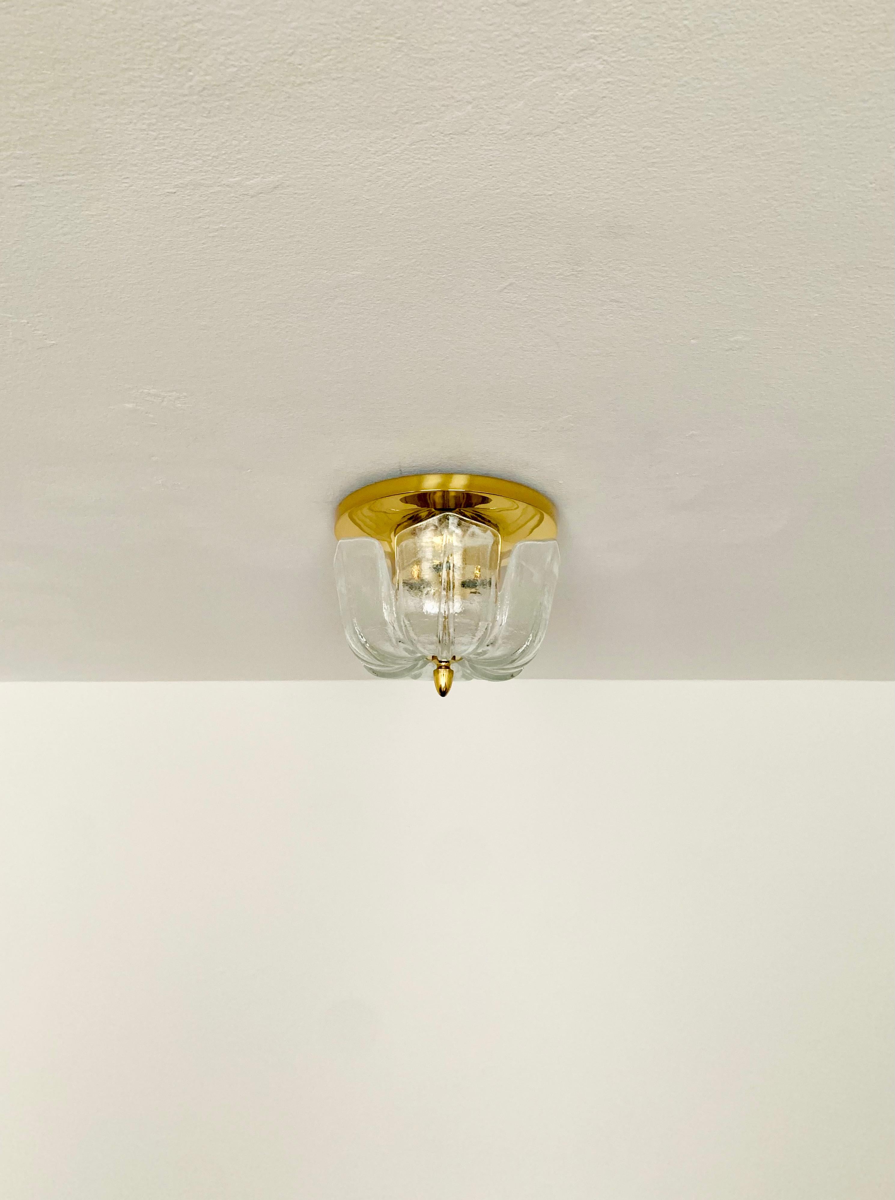 Very nice ceiling lamp from Glashütte Limburg.
The lamp spreads a great play of light in the room and enchants with its charisma.
Wonderful design and very high quality workmanship.

Manufacturer: Glashütte Limburg

Condition:

Very good