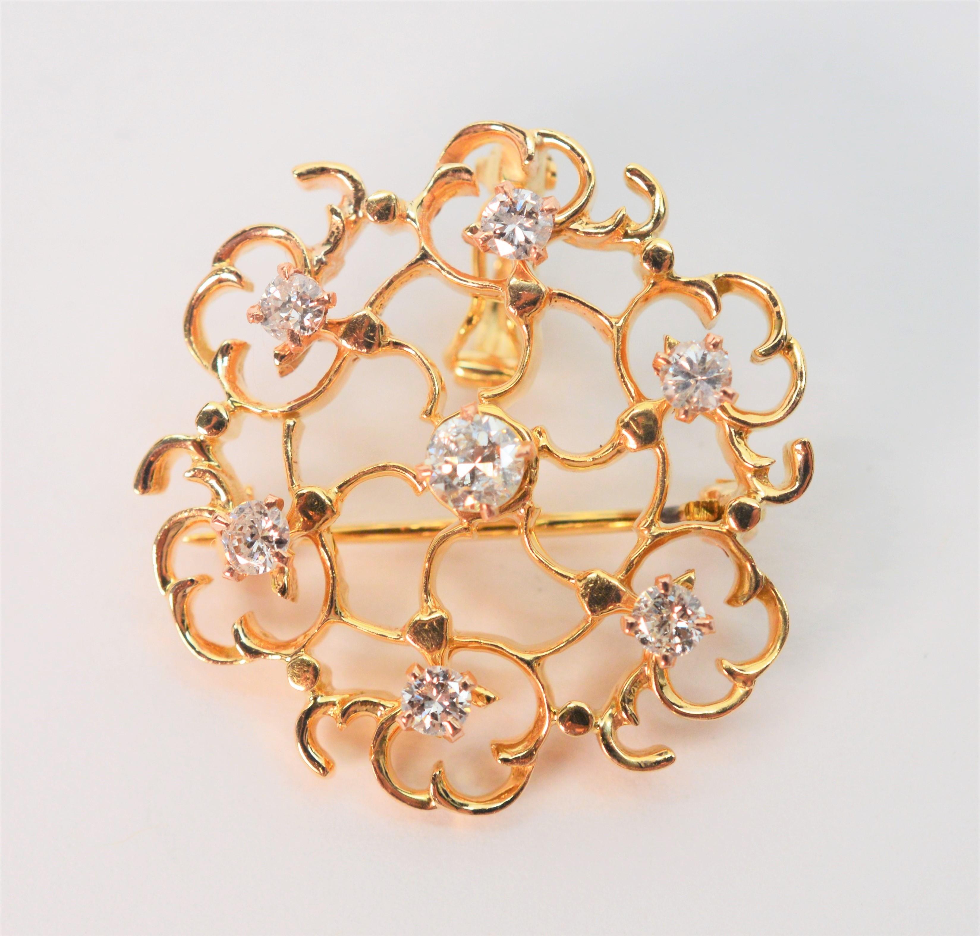 Elevate your look with this sweet jeweled fourteen karat yellow gold 14K accent piece. Perfect to wear as a brooch on a lapel or scarf  or as a pendant added to a chain, choker or strand of pearls.
With seven diamond accents H/SI, total weight .40