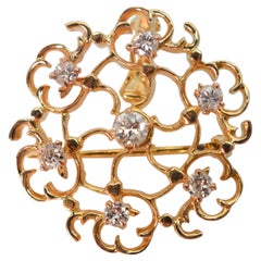 Broche filigrane en or jaune 14 carats avec pendentif d'inspiration florale et diamants